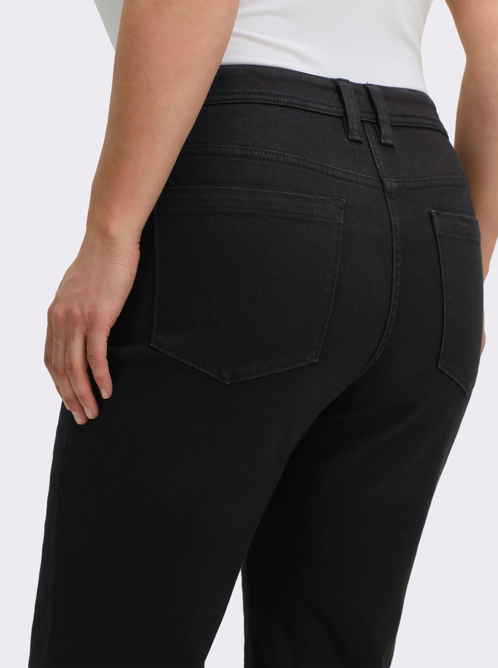 sheego Thermojeans met wijdteregeling op band en zoom - zwart