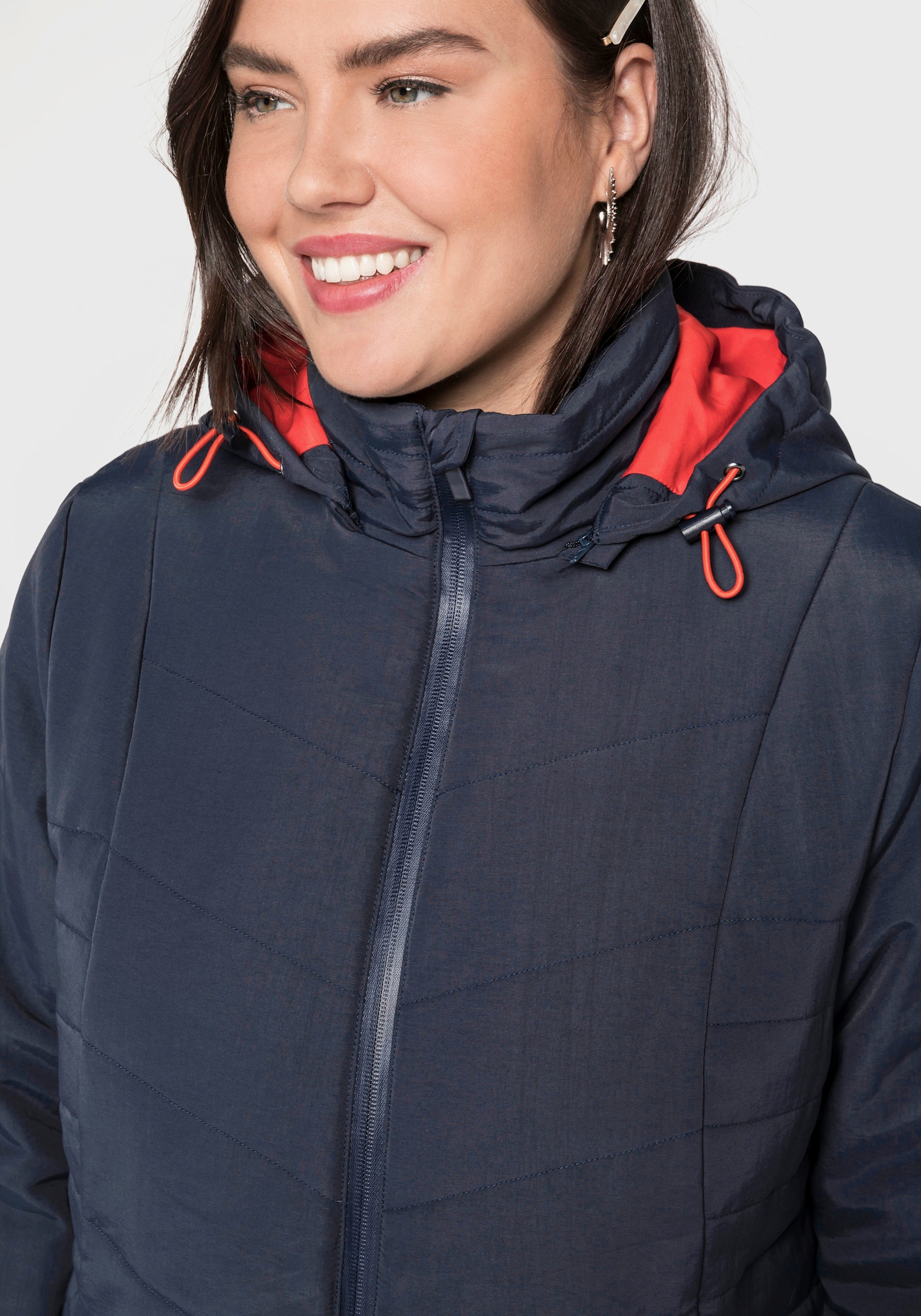 sheego Manteau matelassé avec glissières latérales - bleu nuit