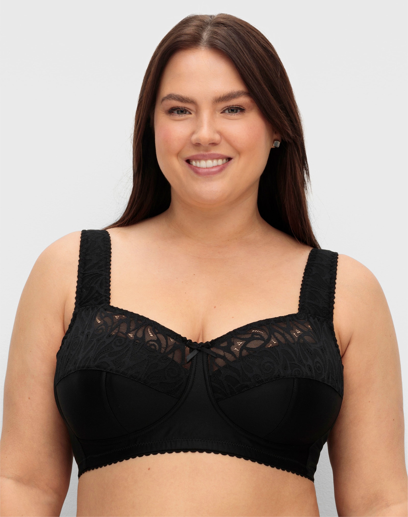 sheego Entlastungs-BH ohne Bügel mit transparenter Spitze - schwarz