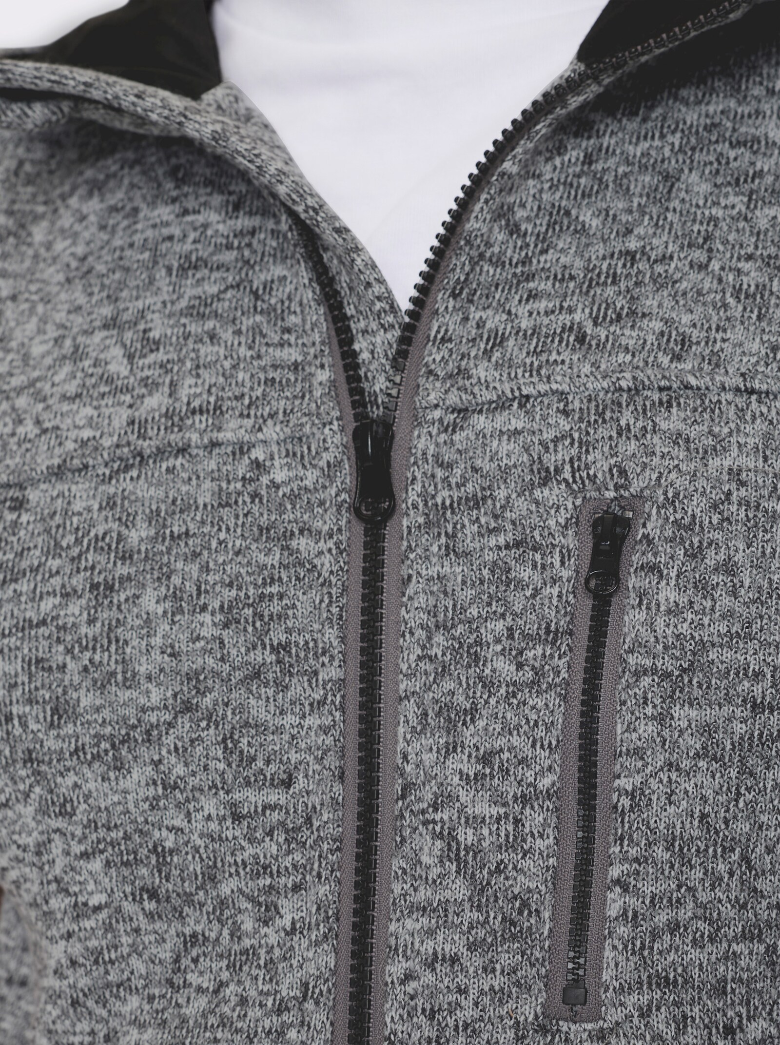 Strickfleecejacke ohne Ärmel - schwarz-meliert