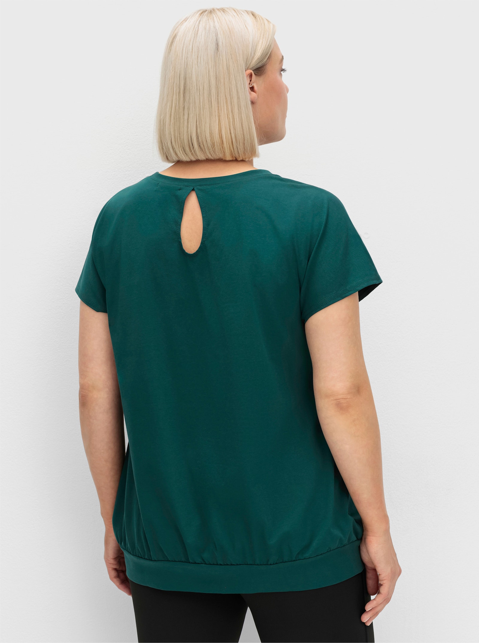 sheego Funktionsshirt mit Cut-out im Nacken - petrol