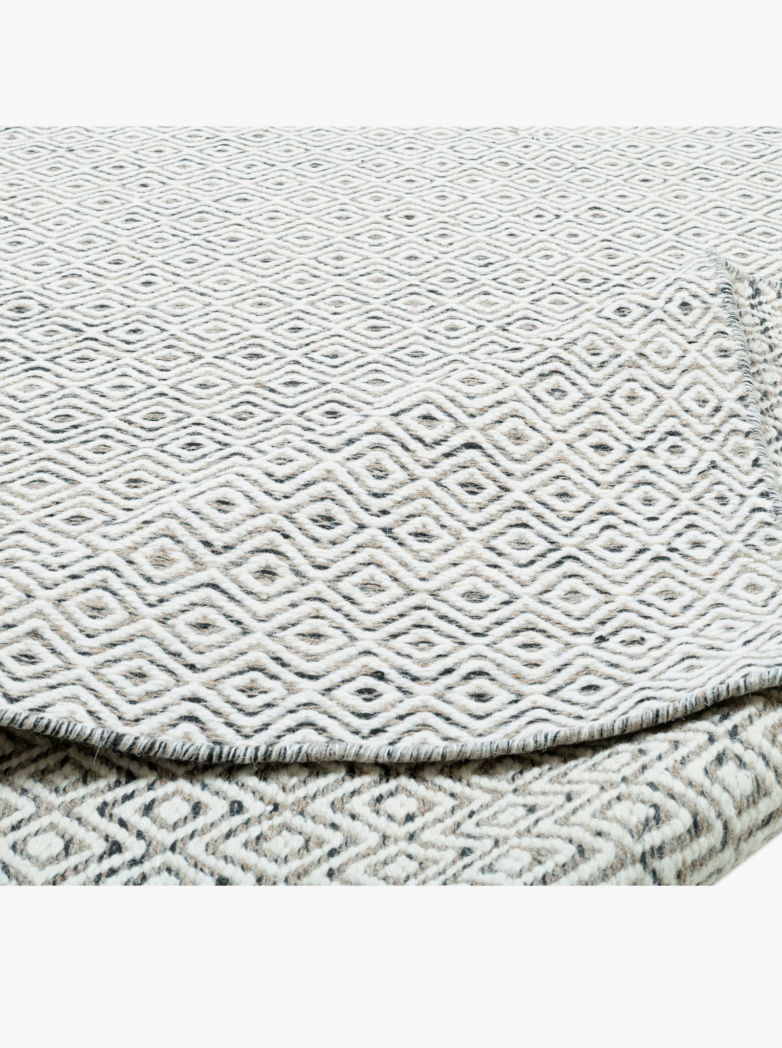 Theko Handwebteppich - grau