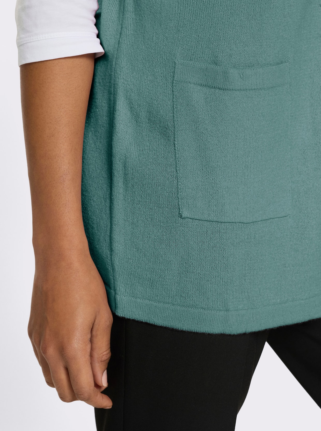 Mouwloos vest in lang model - salie