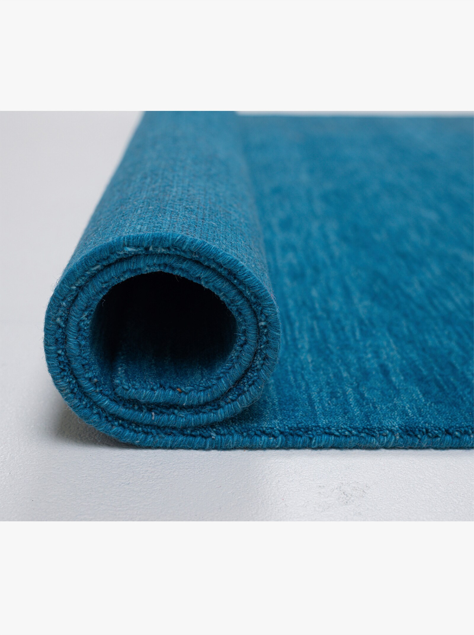 Theko Handwebteppich - blau