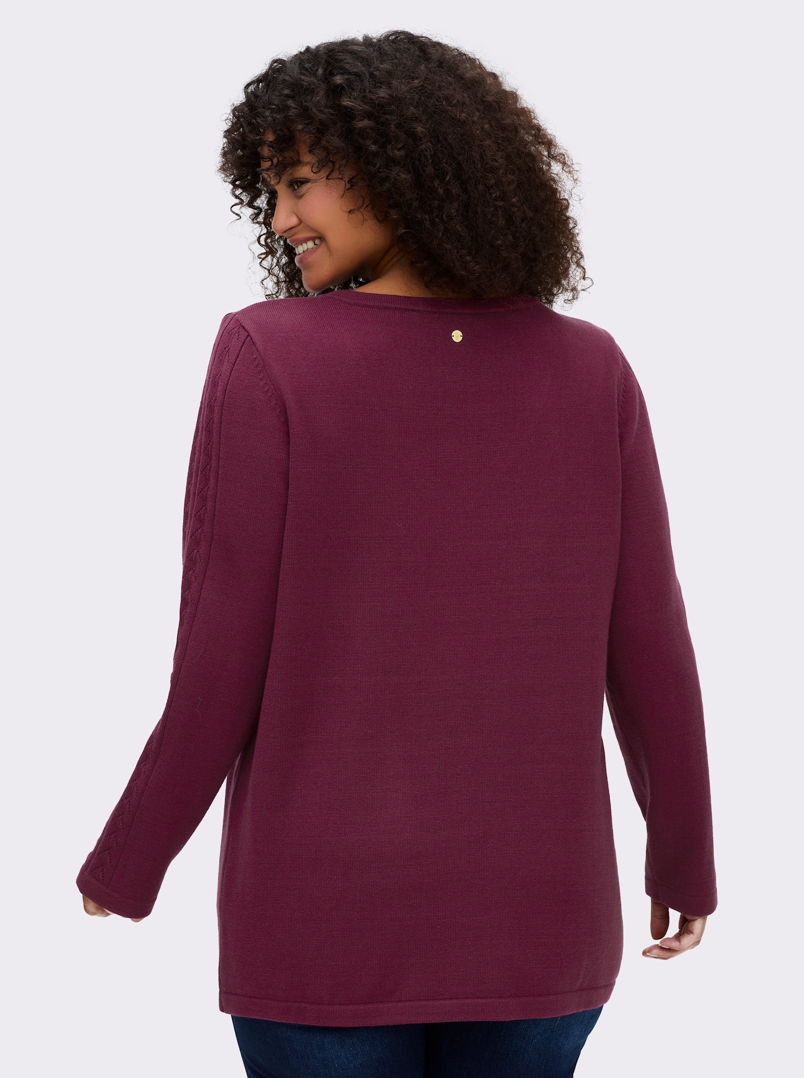 sheego Pullover mit tiefem V-Ausschnitt und Ösenverzierung - bordeaux