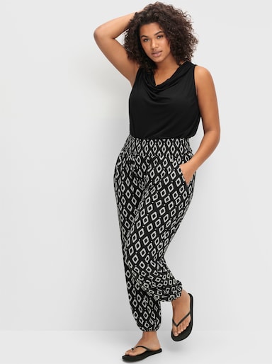 sheego Jogg Pants mit Alloverdruck - schwarz-gemustert