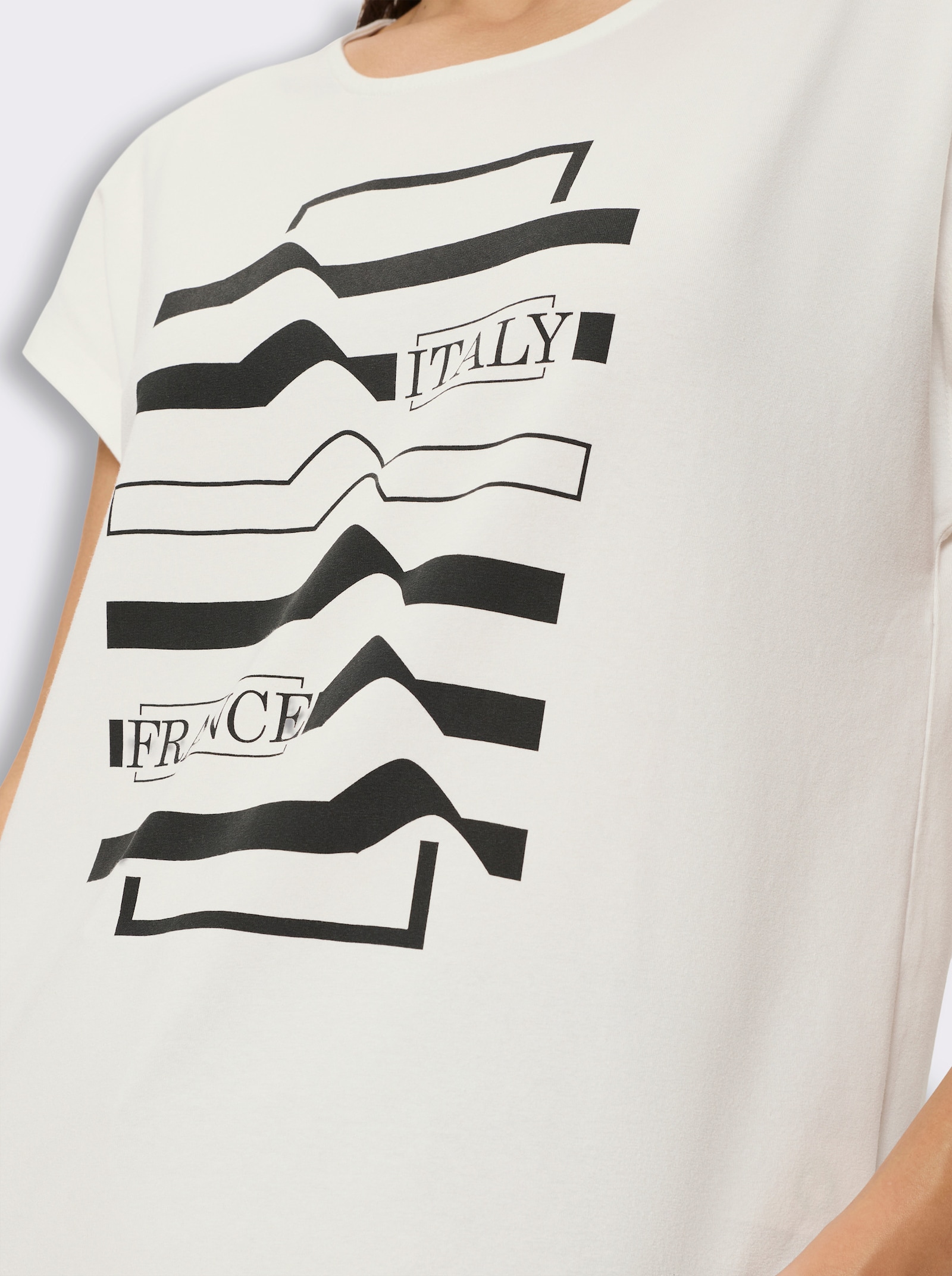 Rundhalsshirt mit überschnittenen Schultern - schwarz-ecru-bedruckt