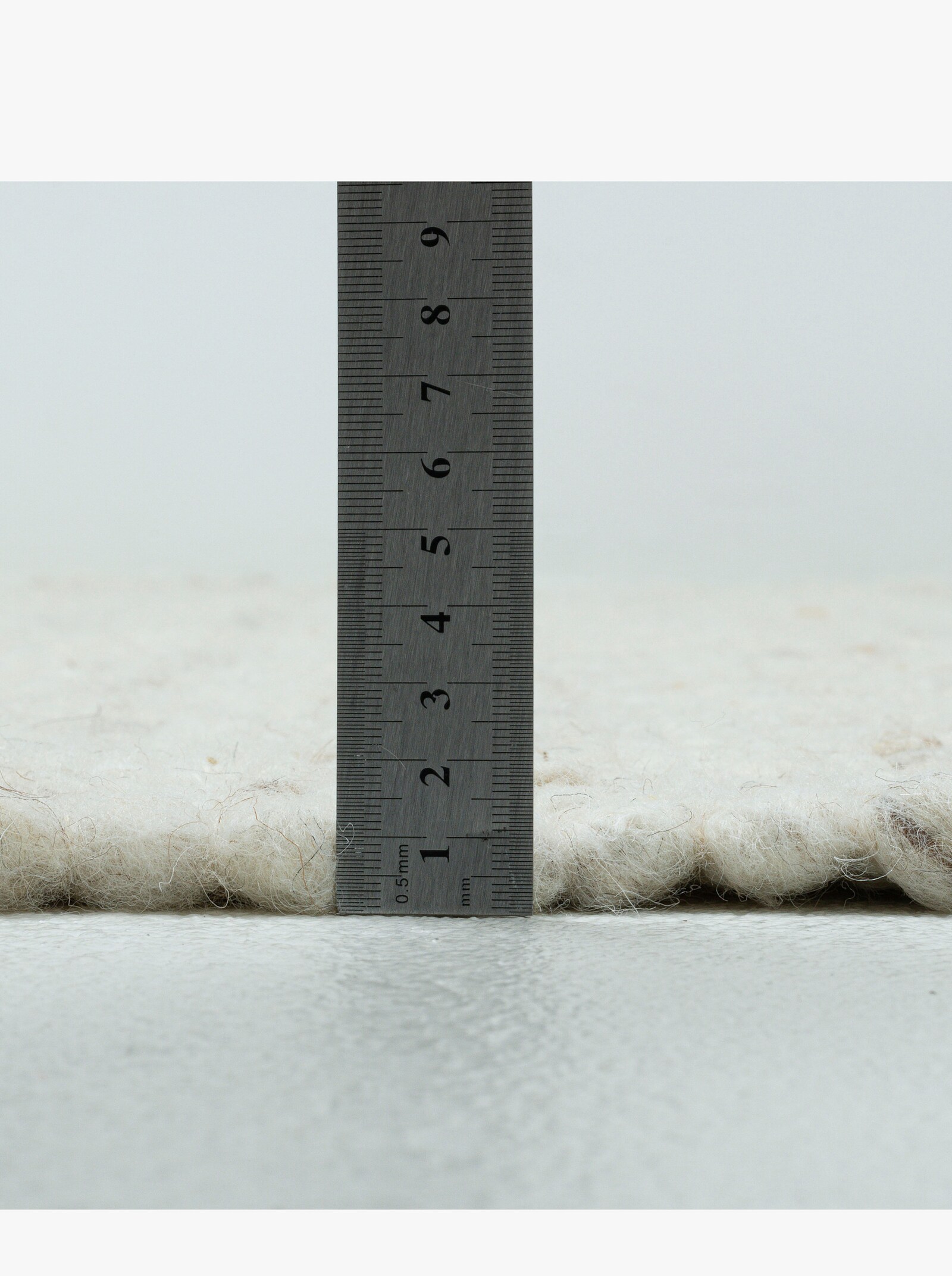 Theko Handwebteppich - natur-meliert