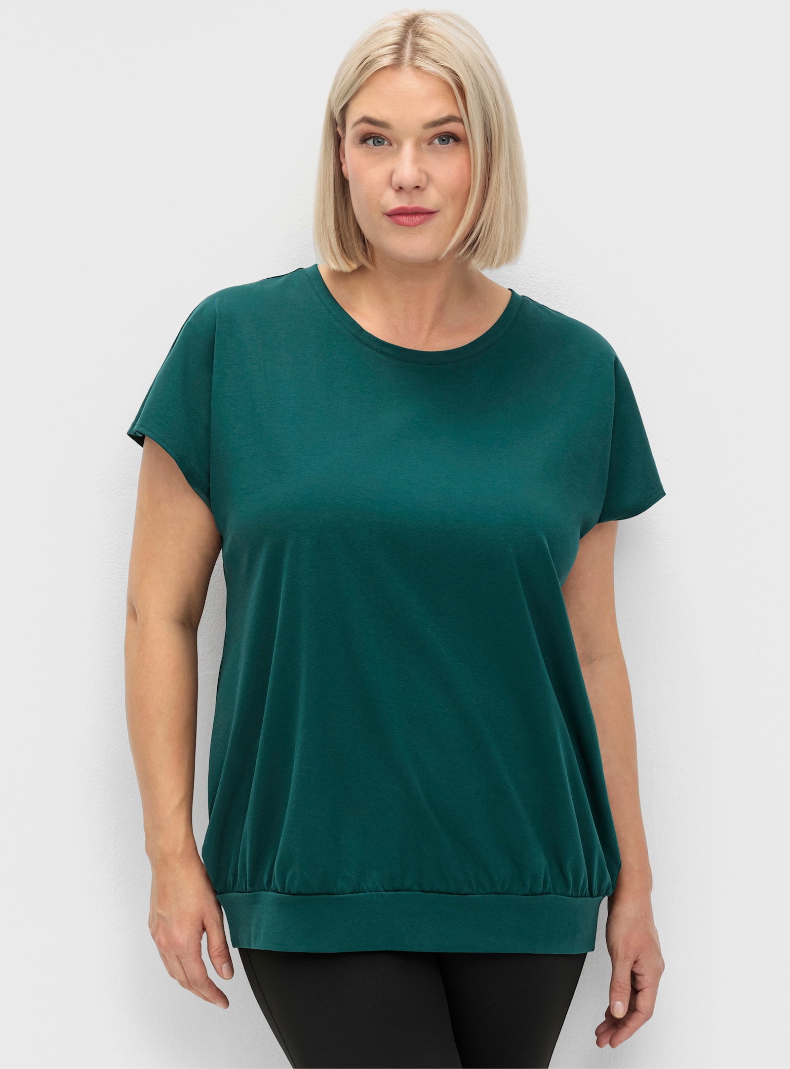 sheego Funktionsshirt mit Cut-out im Nacken - petrol