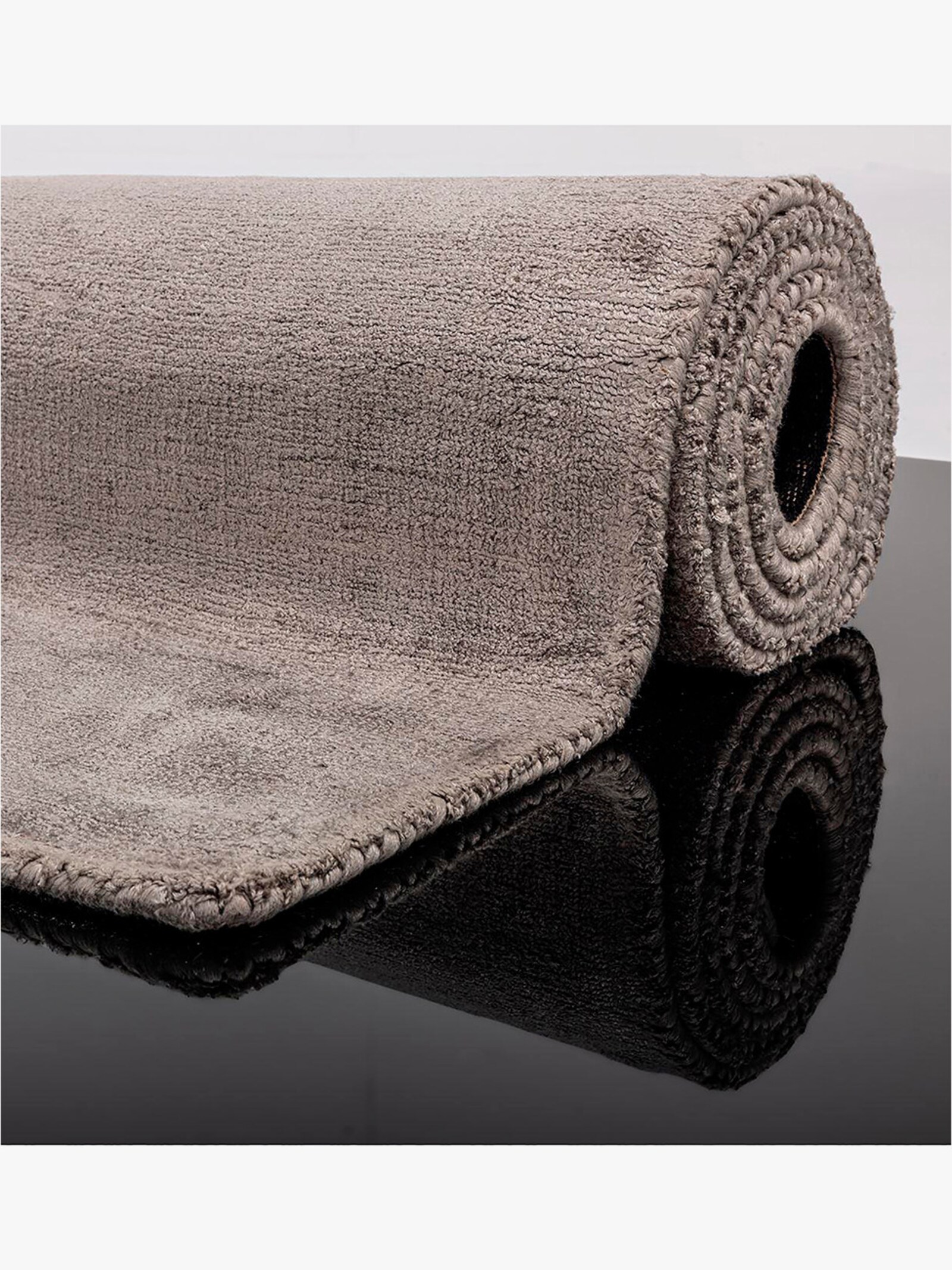 Theko Teppich - grau