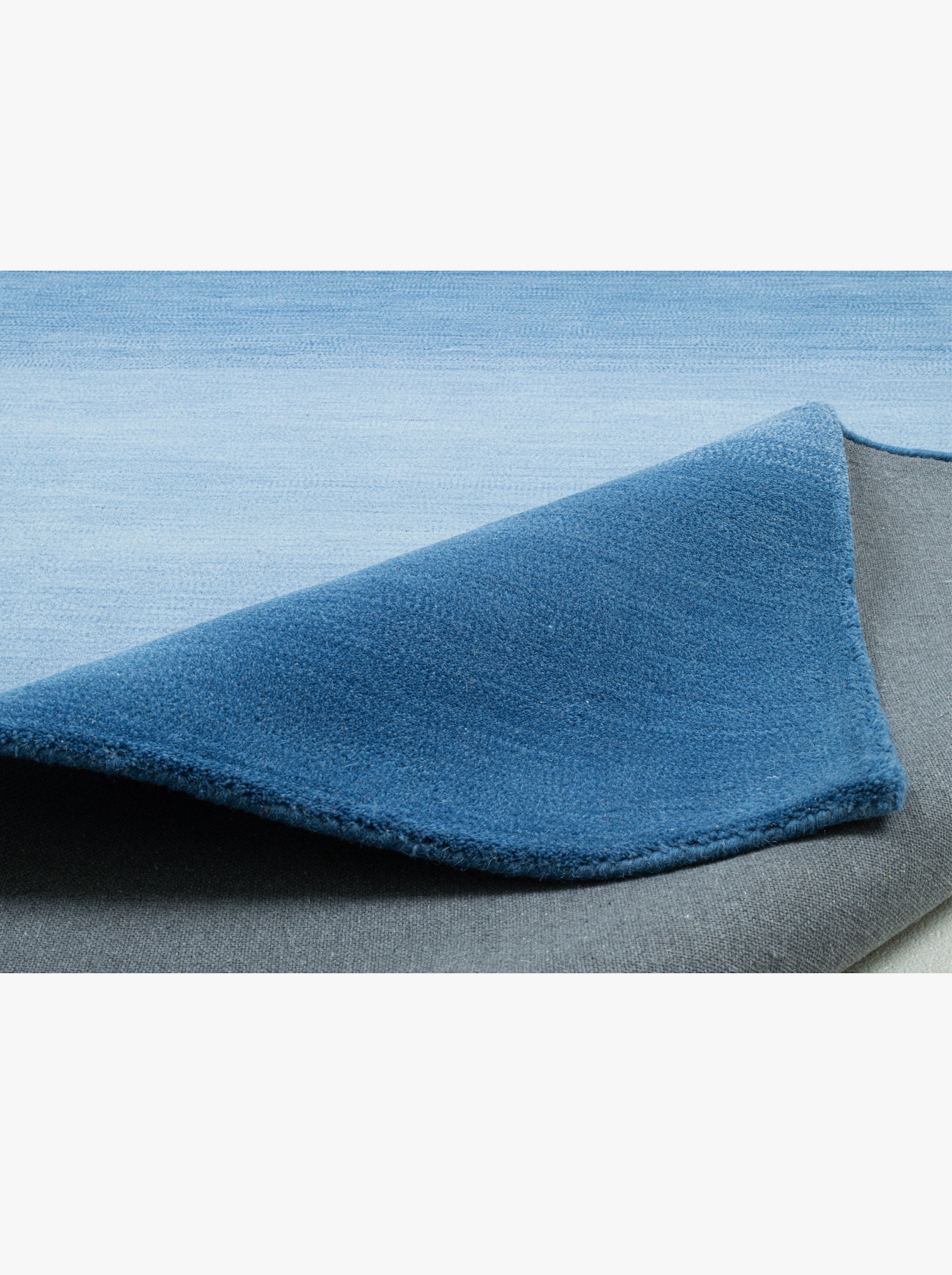 Theko Handwebteppich - blau