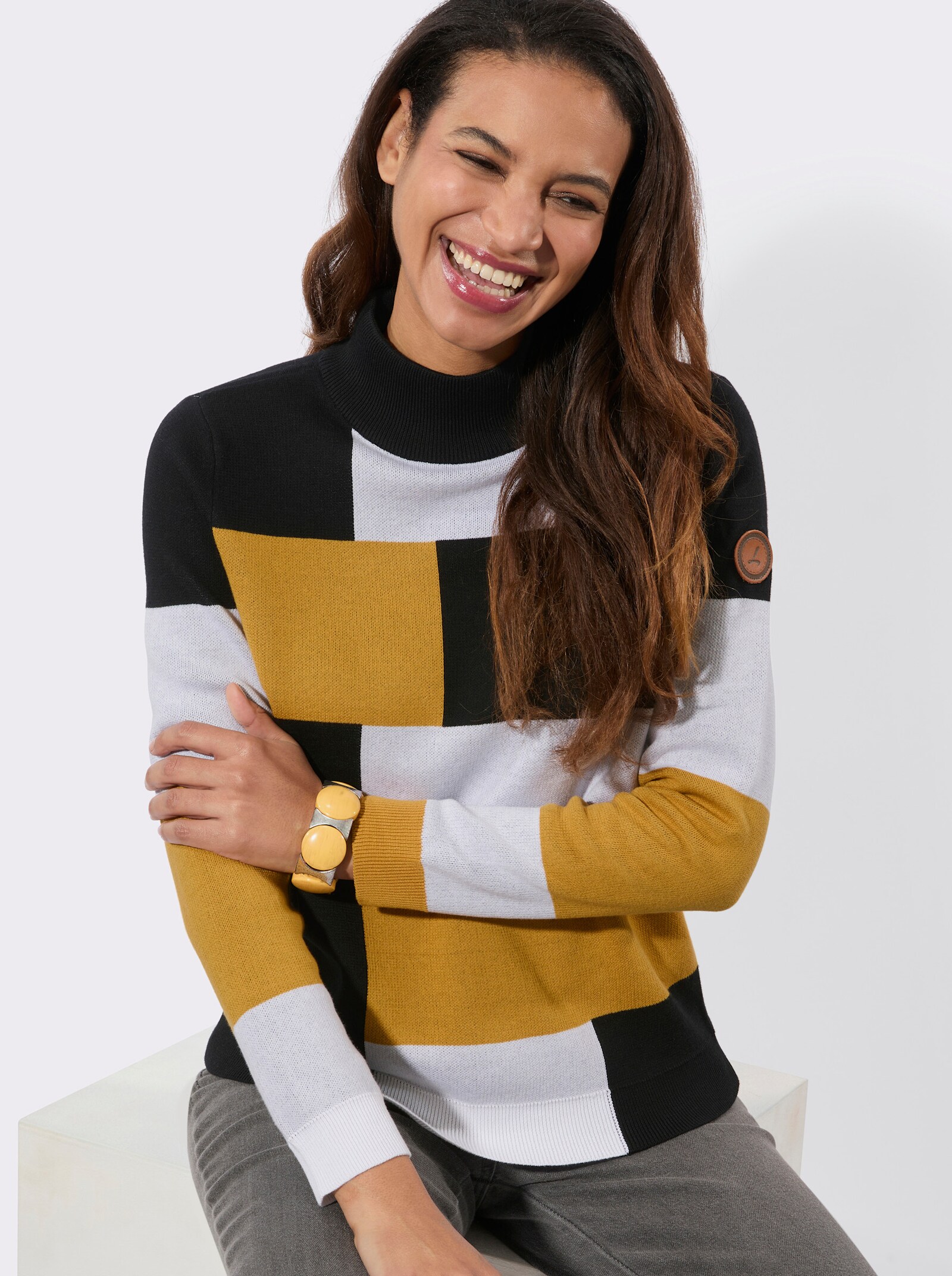 Langarm-Pullover mit Stehkragen - ocker-schwarz-gemustert