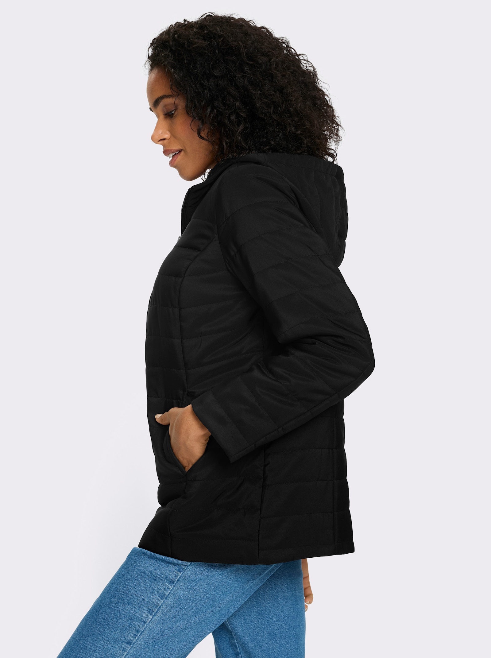 Steppjacke mit bedrucktem Futter - schwarz