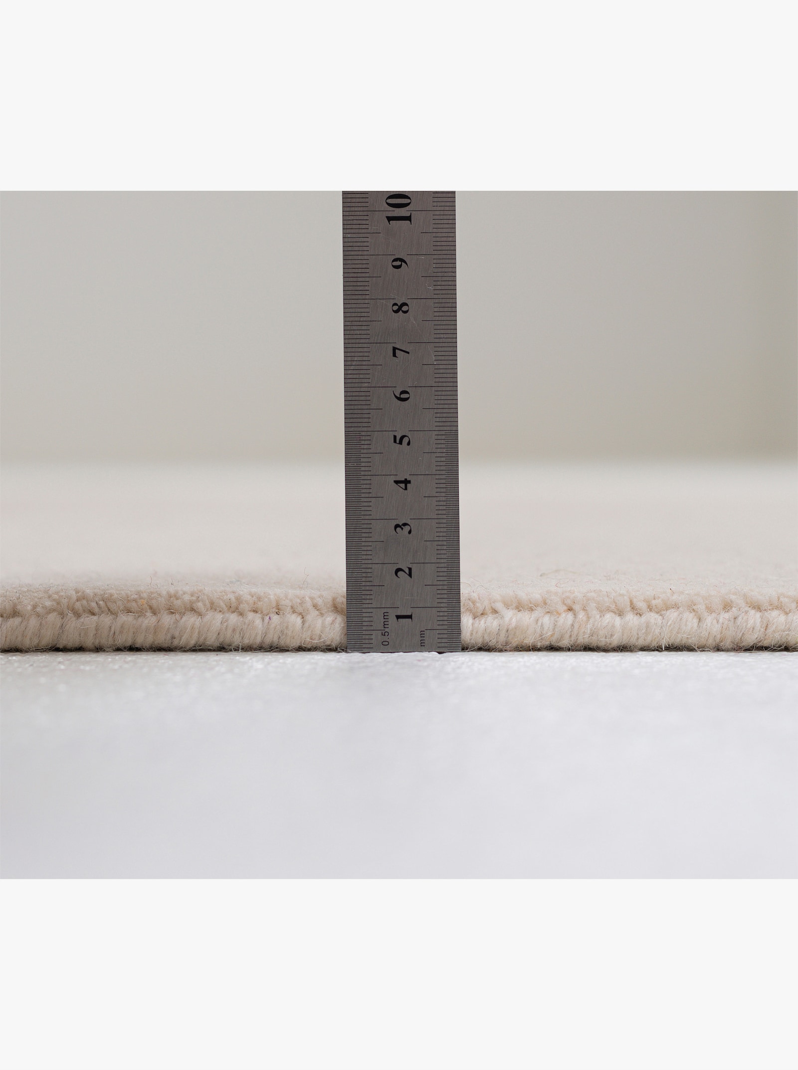 Theko Handwebteppich - wollweiß