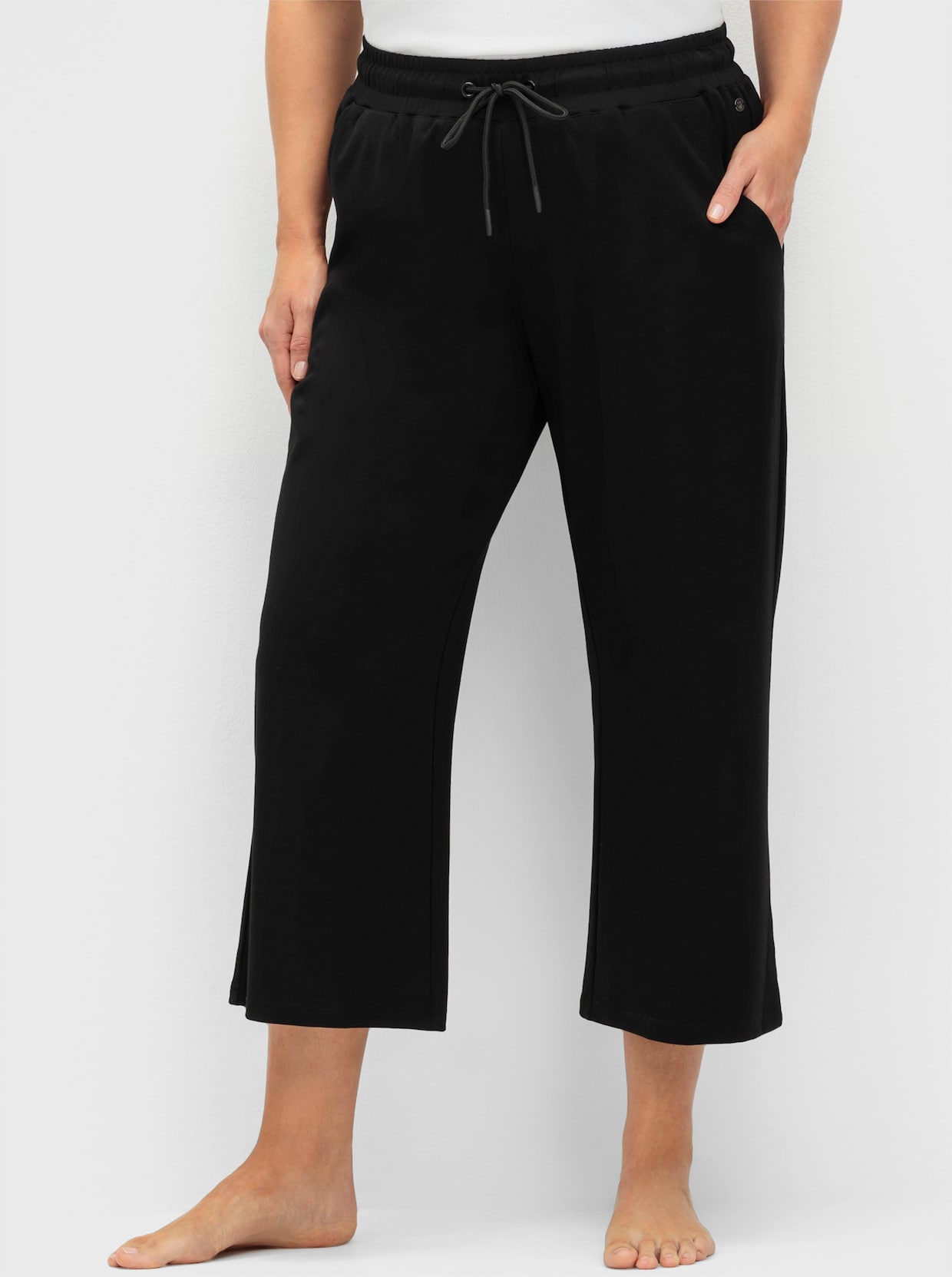 sheego Sportbroek - zwart