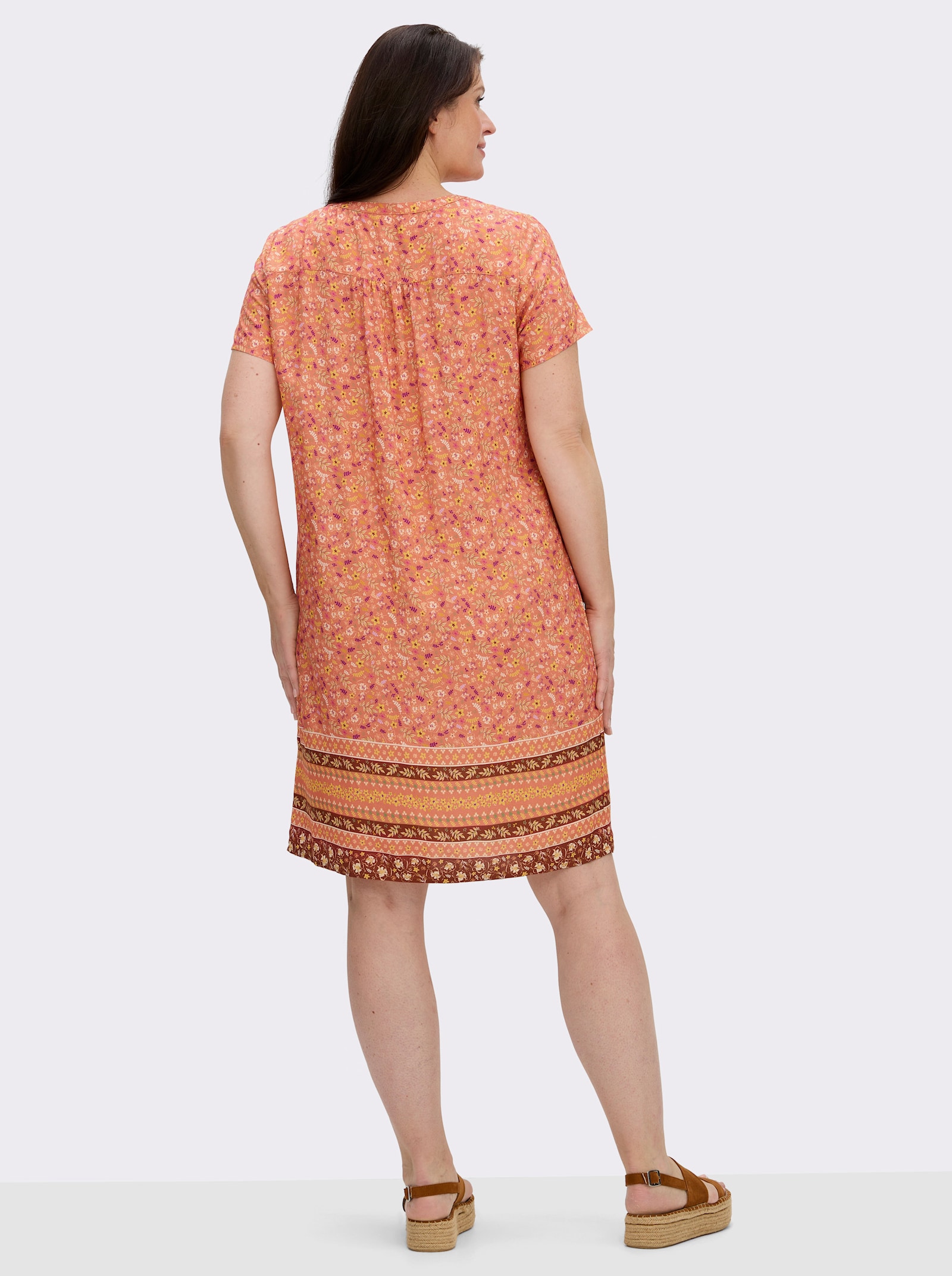 Druckkleid mit Blümchen- und Bordürenmuster - papaya-rotbraun-bedruckt