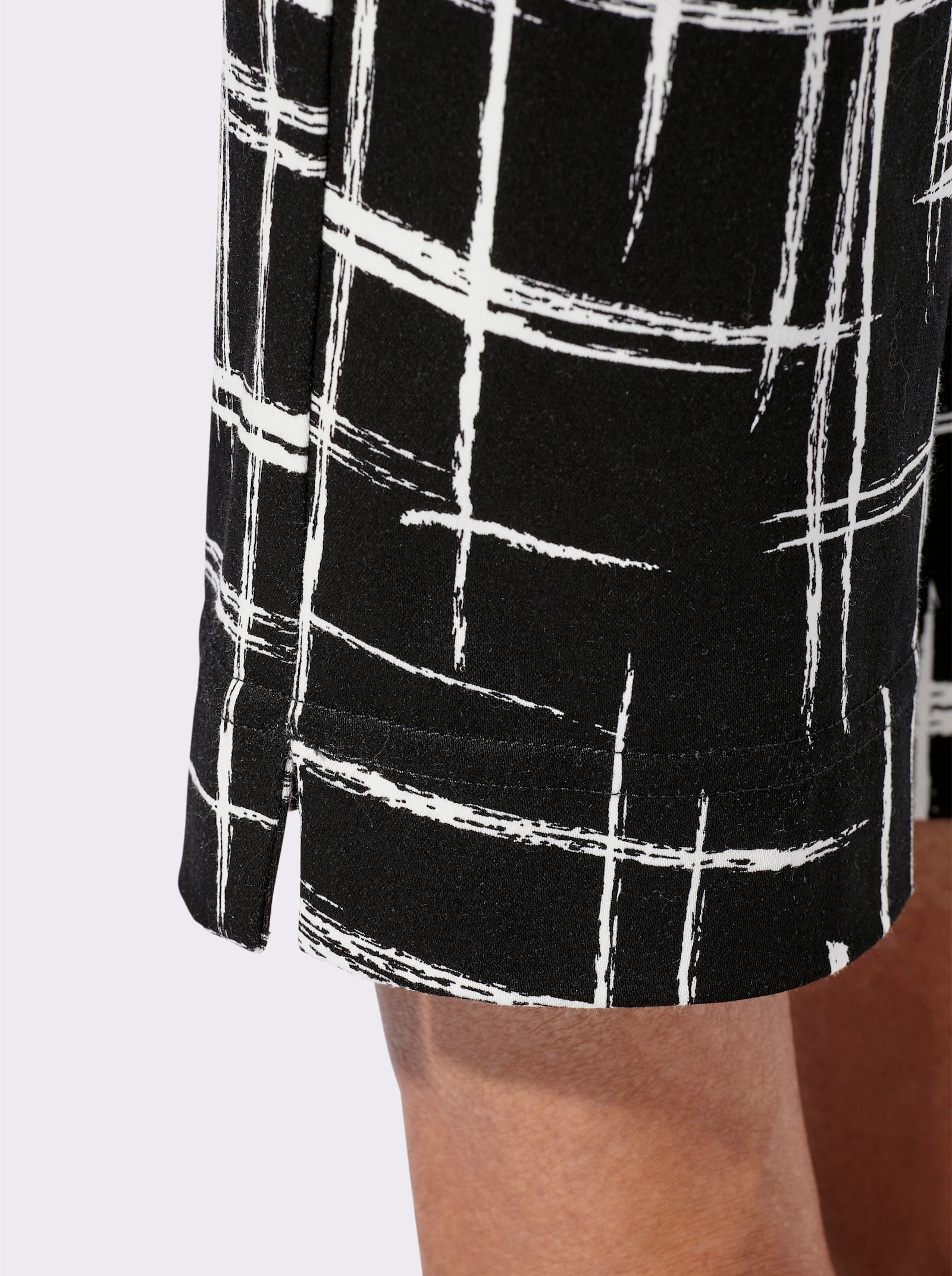 Schlupfhose mit Reißverschluss-Taschen - schwarz-weiß-bedruckt