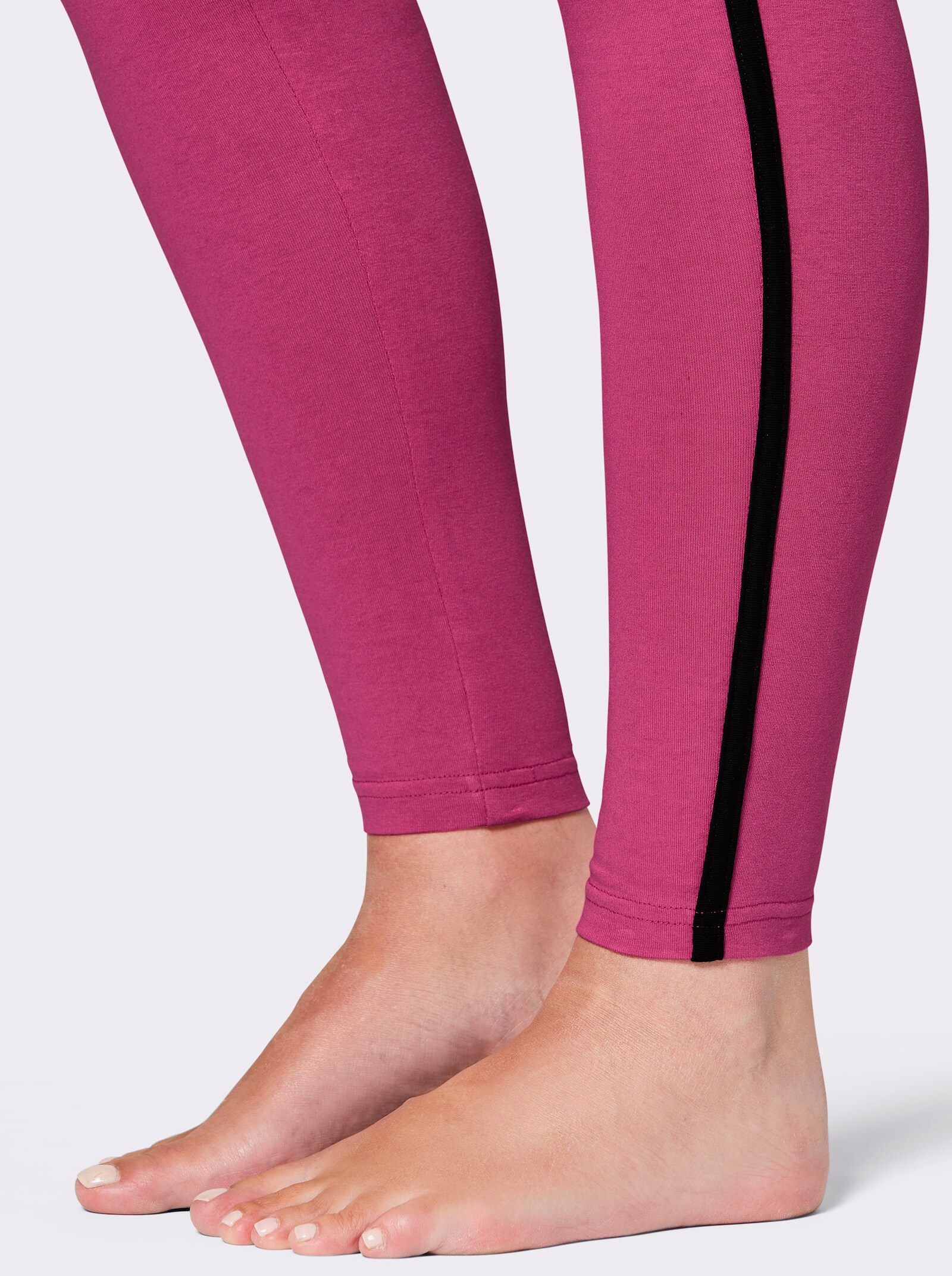 feel good Leggings mit seitlicher Paspel - schwarz + fuchsia