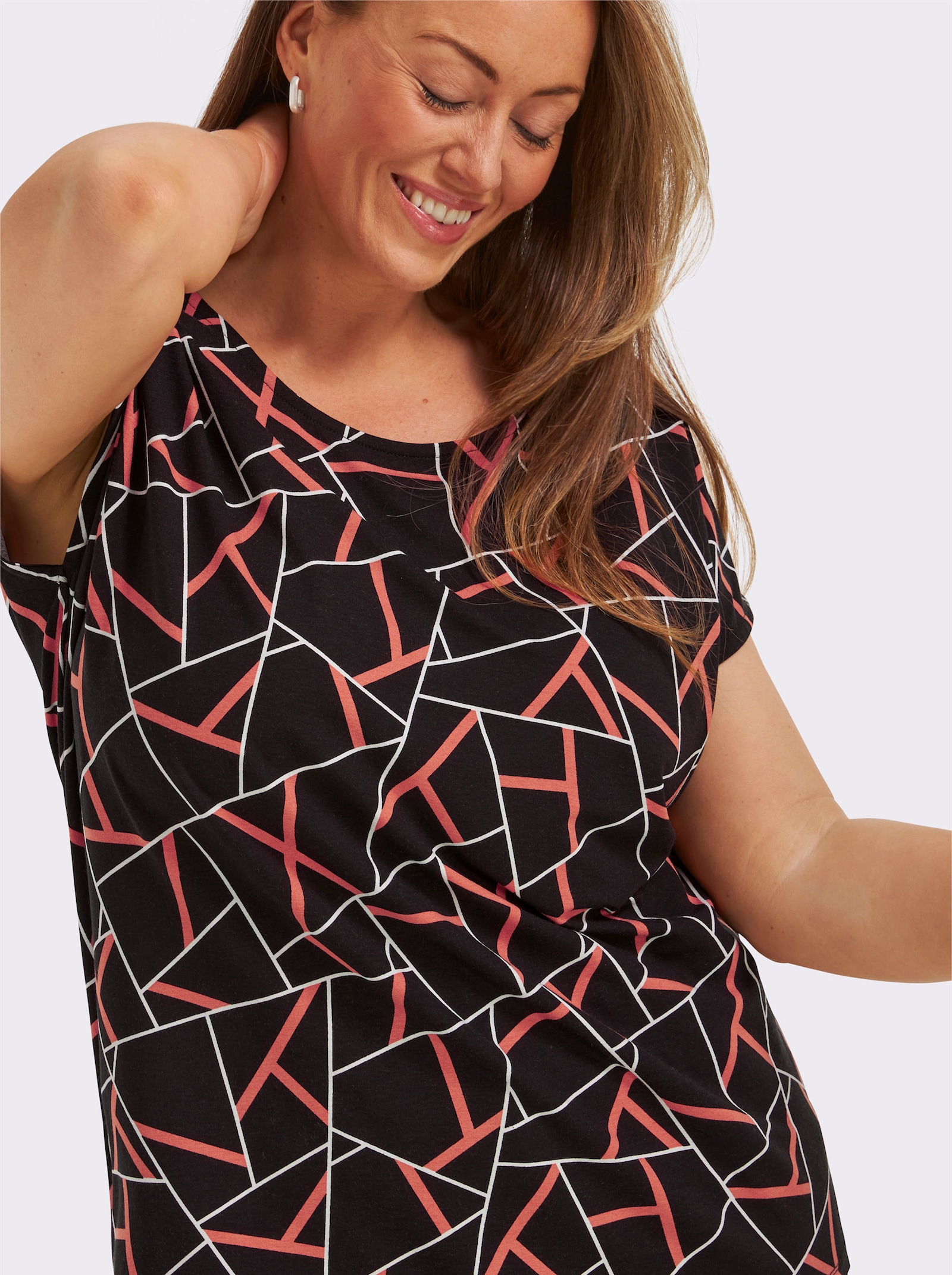 Kurzarmshirt mit grafischem Dessin - schwarz-papaya