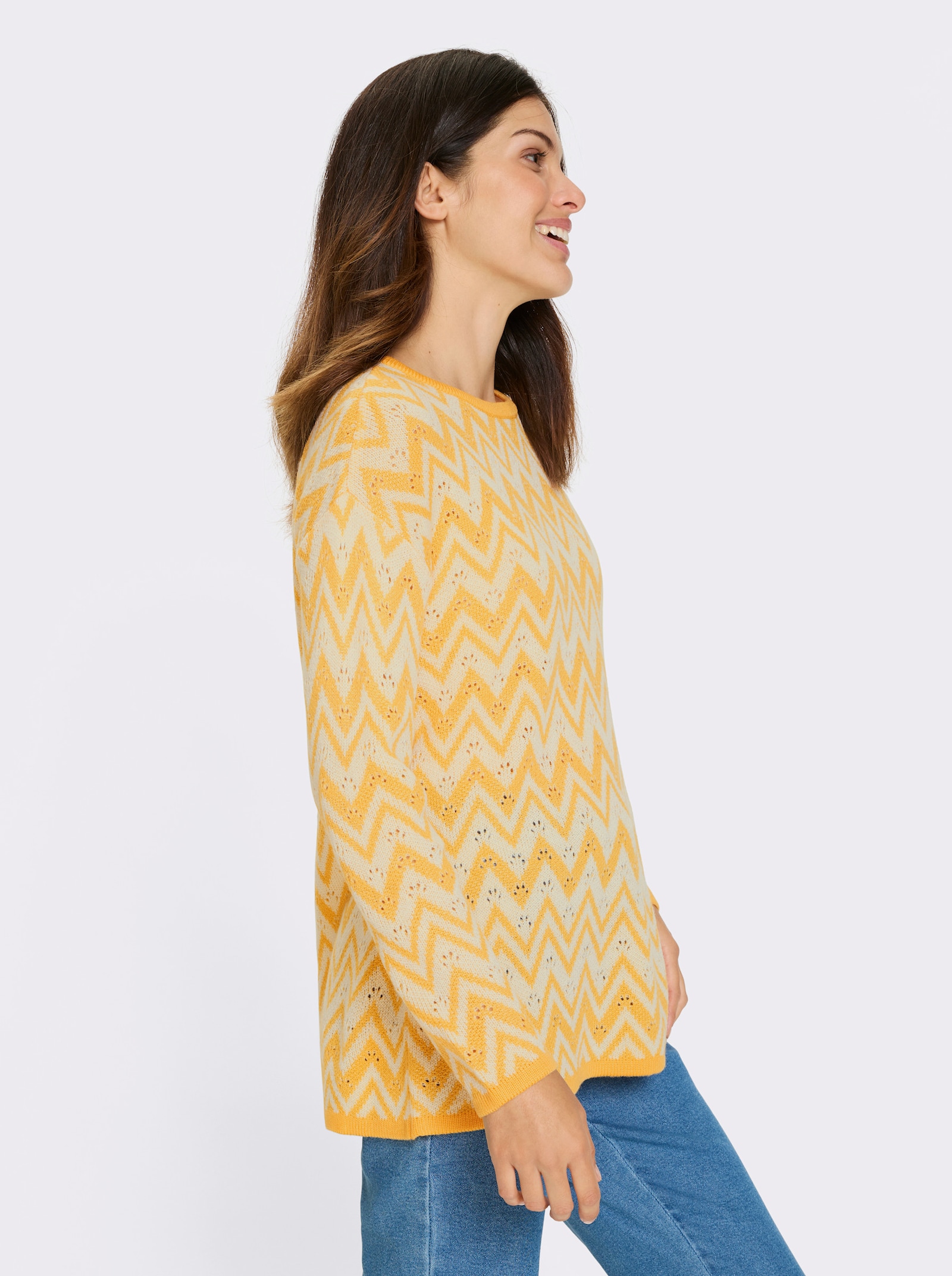 Lange pullover met zigzag- en ajourpatroon - geel/wit gedessineerd