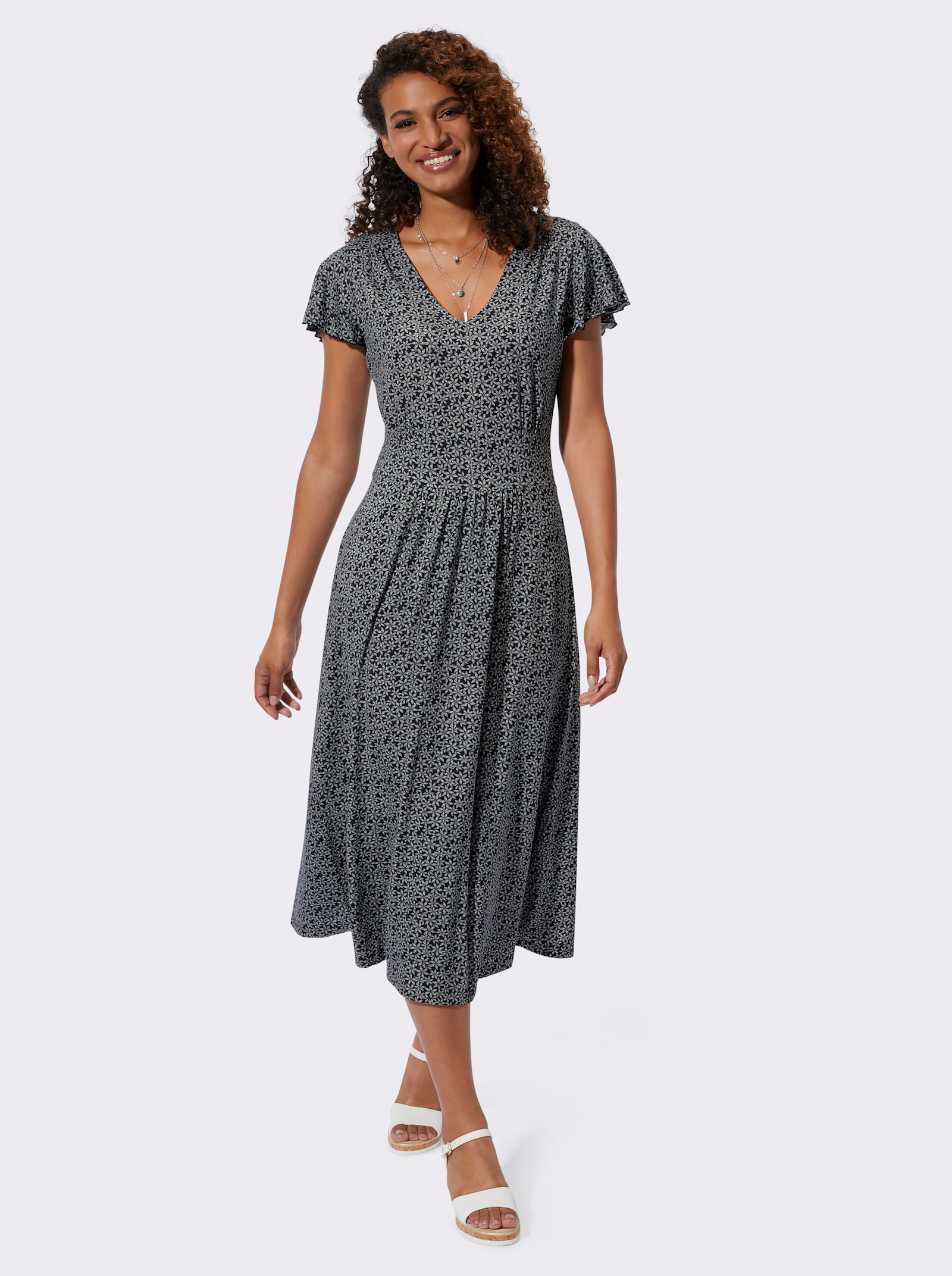 Jerseykleid mit Flügelärmeln und Smokpartie hinten - schwarz-weiß-bedruckt