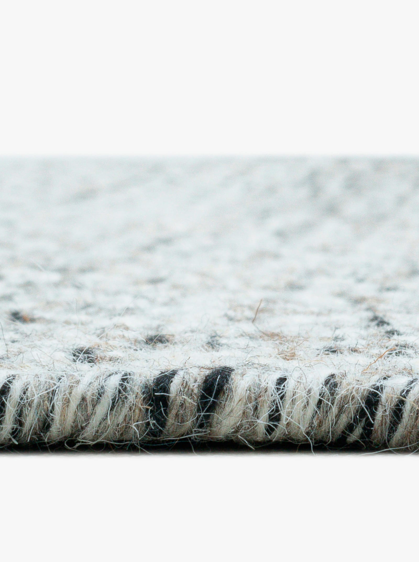 Theko Handwebteppich - grau