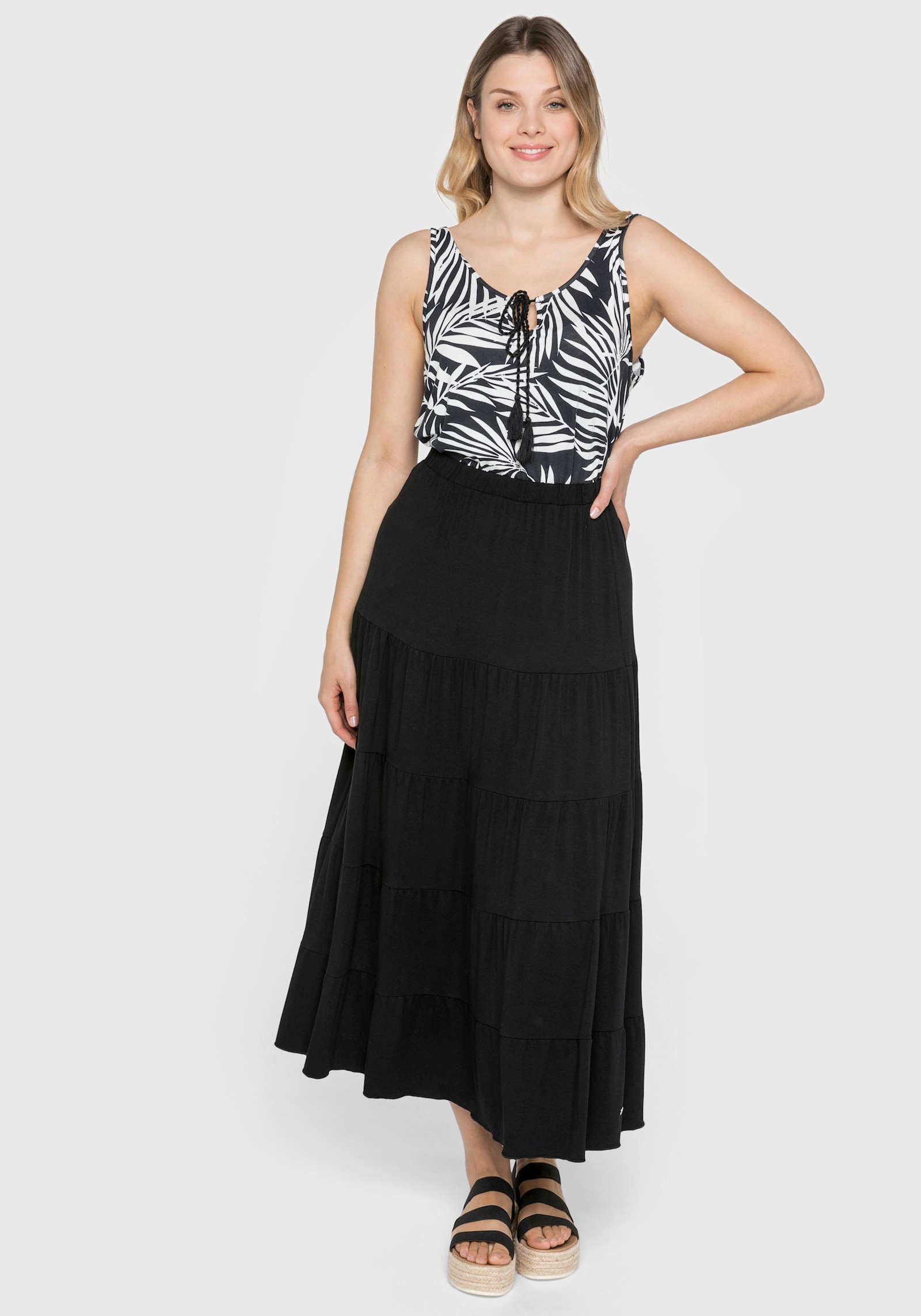 sheego Jerseyrock mit stufigen Volants - schwarz