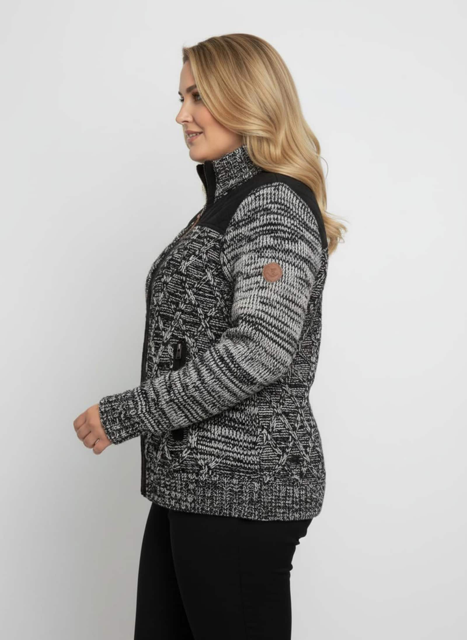 Strickjacke , hinten glatt gestrickt - schwarz-meliert