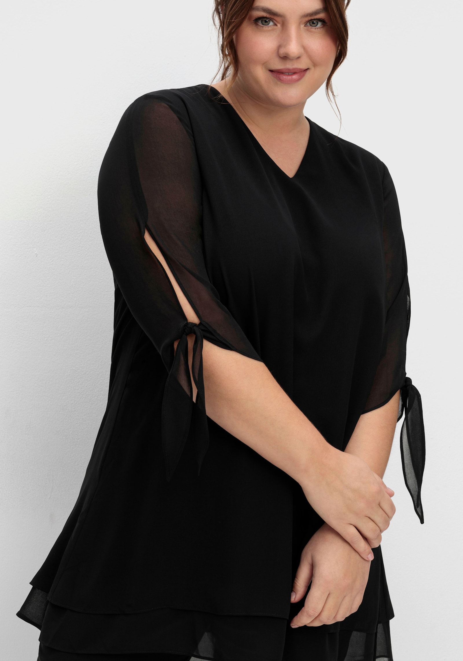 sheego Chiffonbluse in Lagenoptik - schwarz