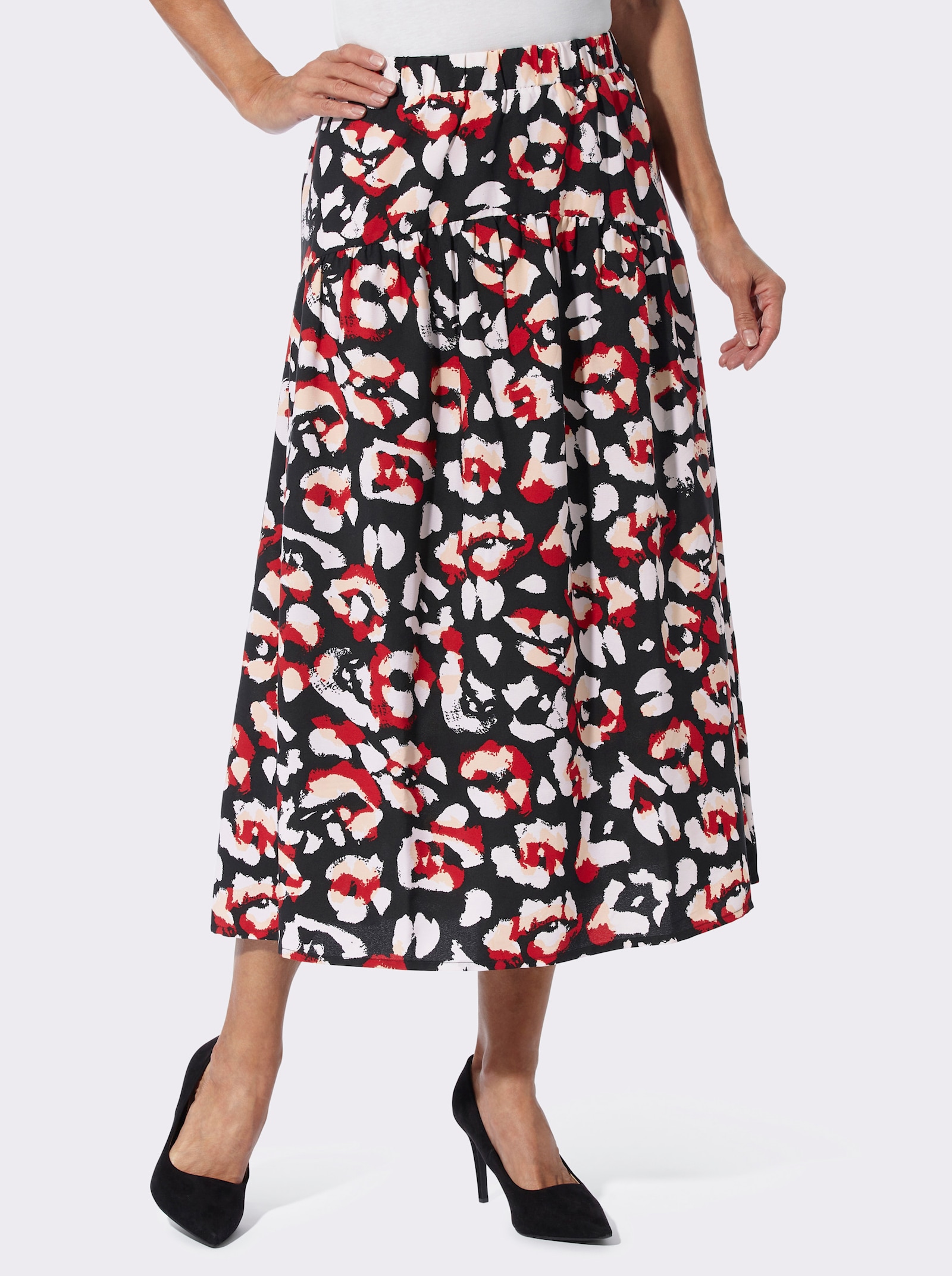 Comfortrok van gerecycled polyester - zwart/rood geprint