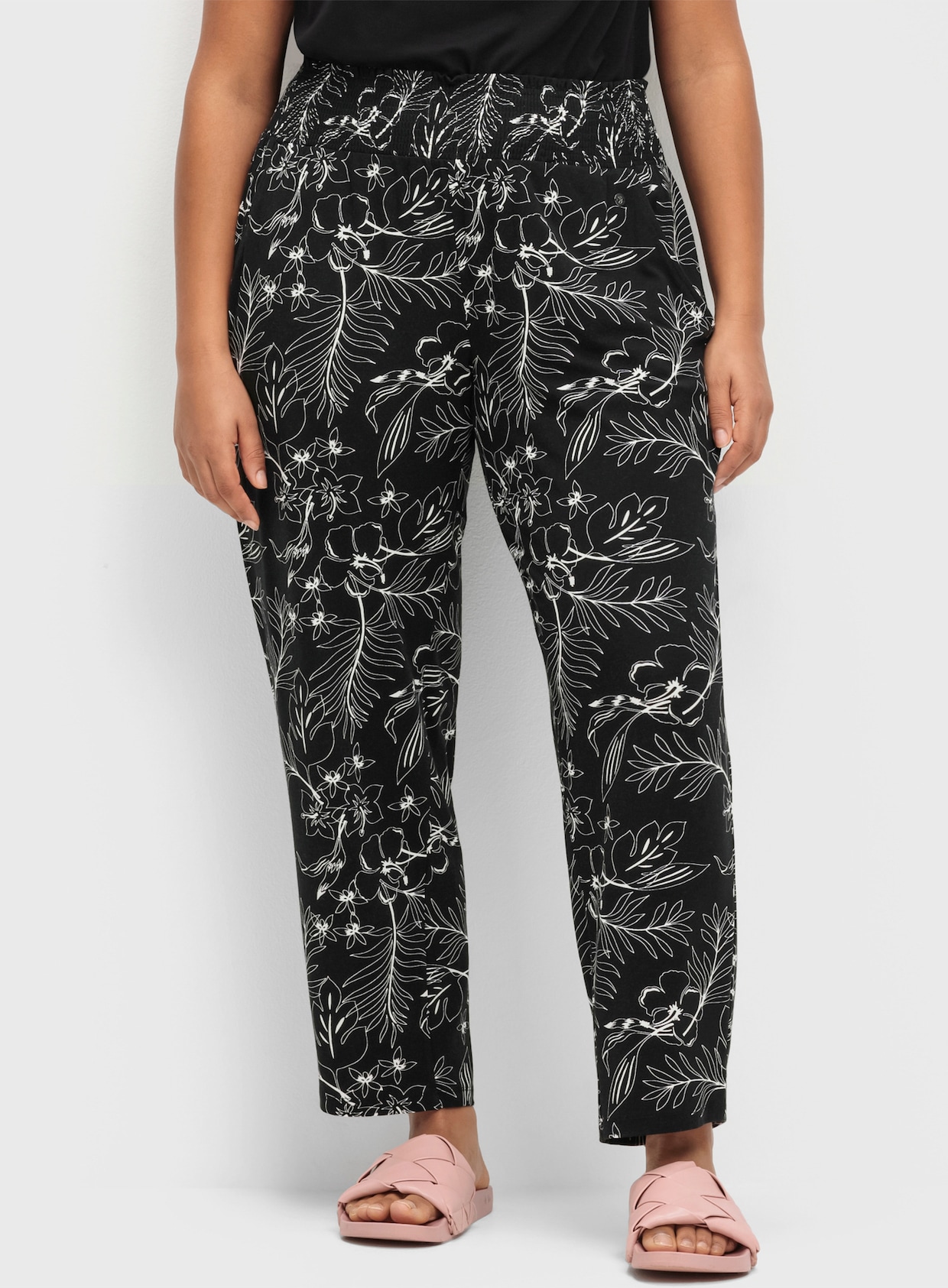sheego Pantalon - noir à motifs
