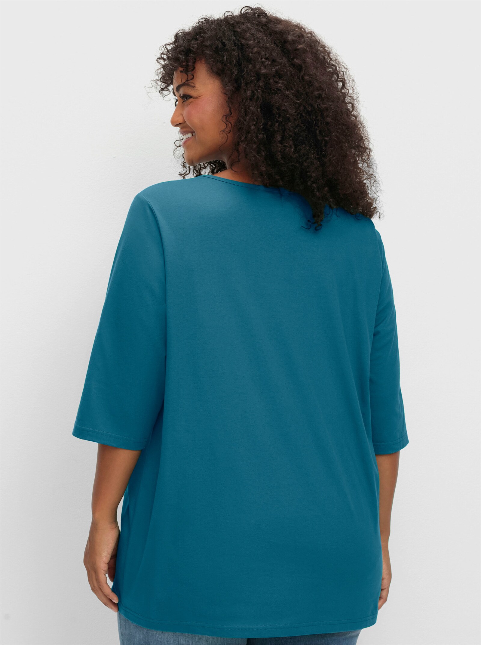 sheego Shirt met 3/4-mouwen en rechte, langere snit - topaas