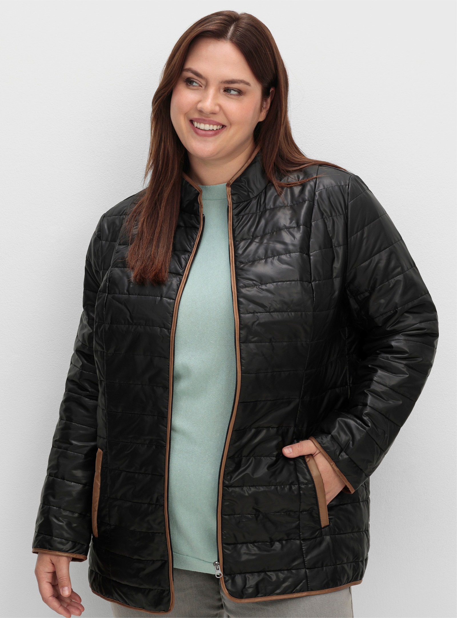 Steppjacke mit kontrastfarbigem Futter - schwarz