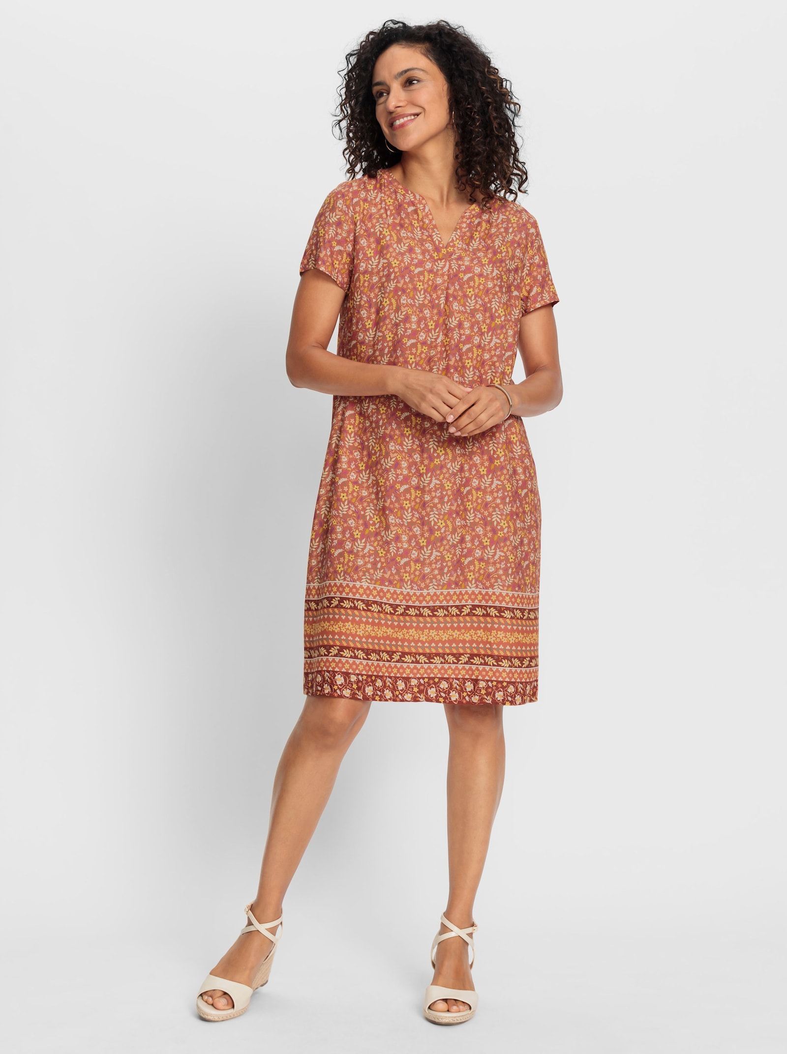 Druckkleid mit Blümchen- und Bordürenmuster - papaya-rotbraun-bedruckt