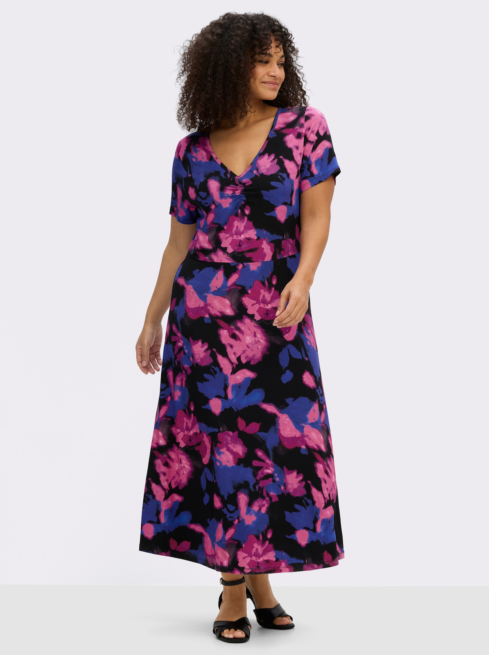 sheego by Joe Browns Jerseykleid mit leuchtendem Blumenmuster - schwarz-pink-gemustert