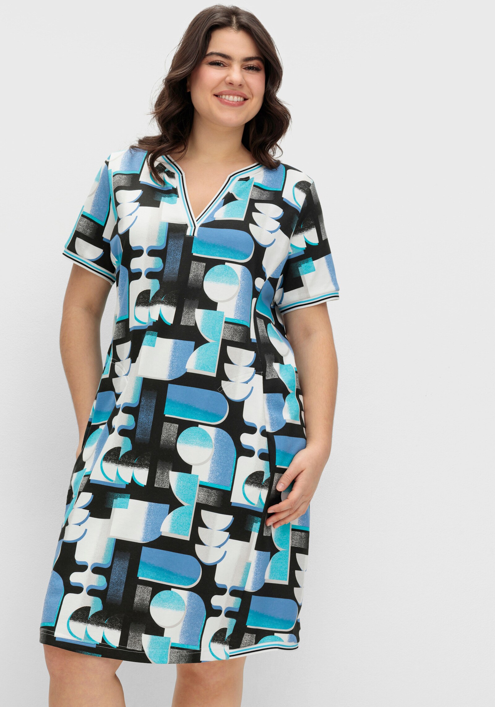 Shirtkleid in bedruckter Sweat-Qualität - türkis-schwarz-bedruckt