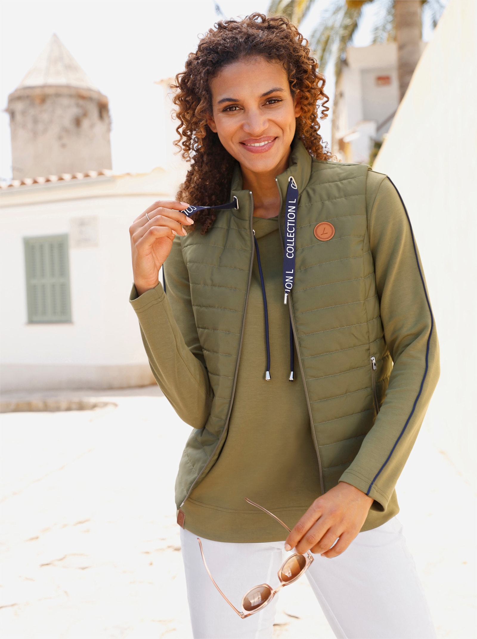 Steppweste mit Lettering-Detail - oliv