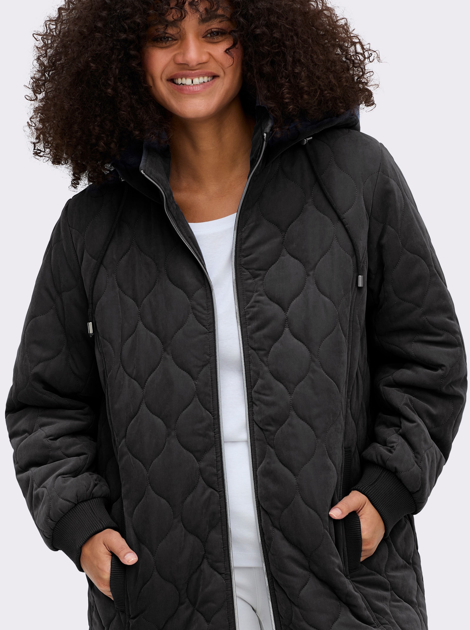 sheego Blousonjacke mit Wellensteppung, warm wattiert - schwarz