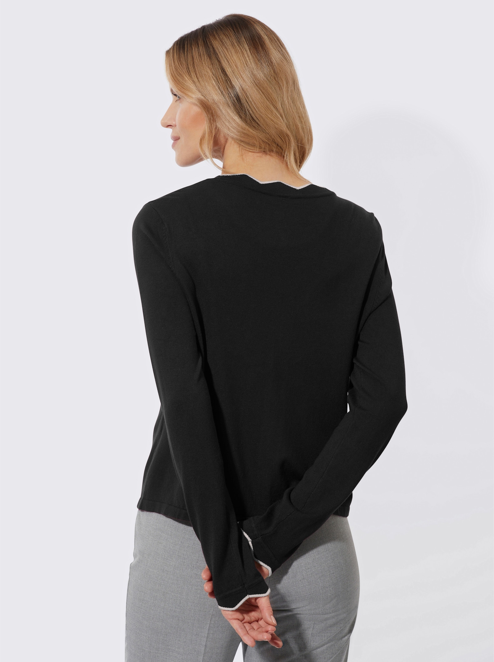 Strickjacke mit gewellten Abschlüssen - schwarz