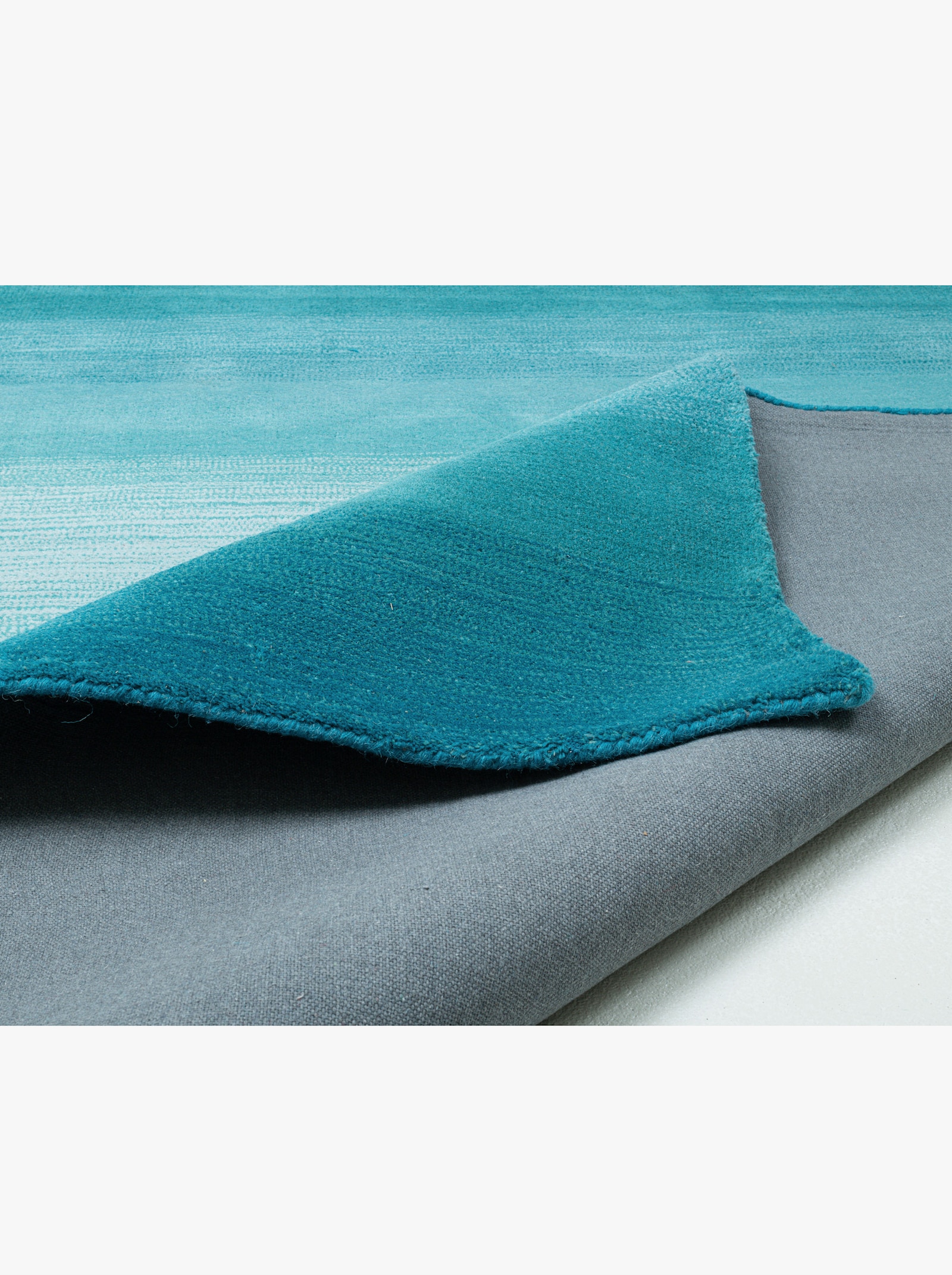 Theko Handwebteppich - türkis