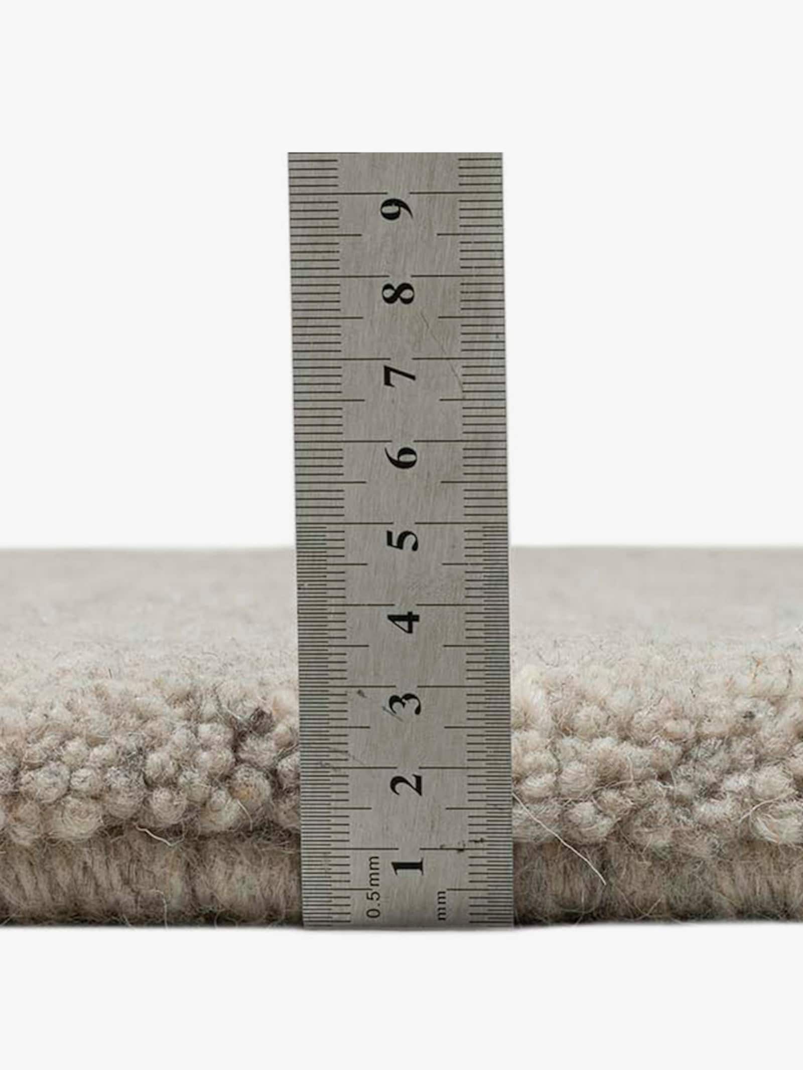 Theko Teppich - sand-meliert