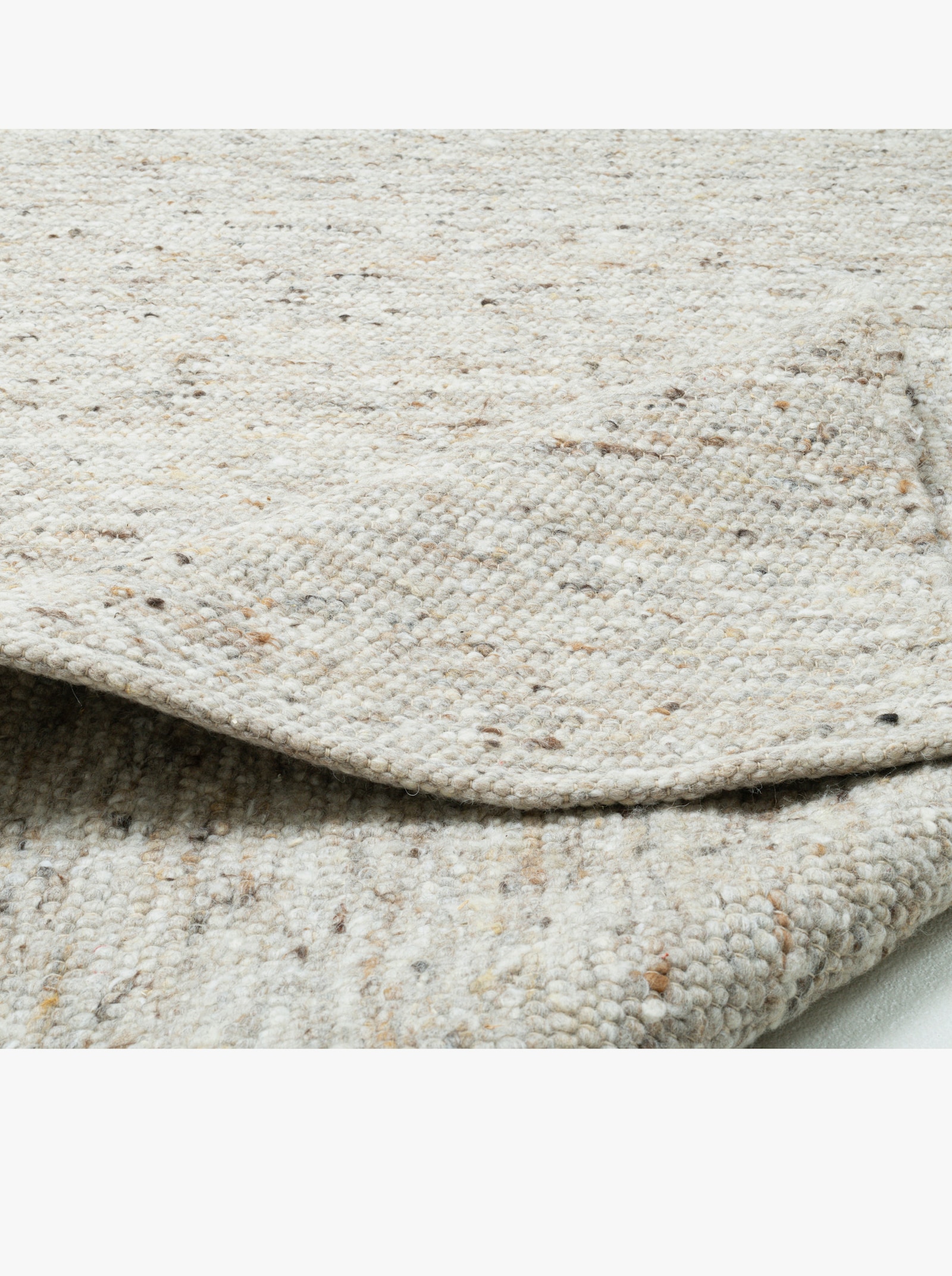 Theko Handwebteppich - sand-meliert