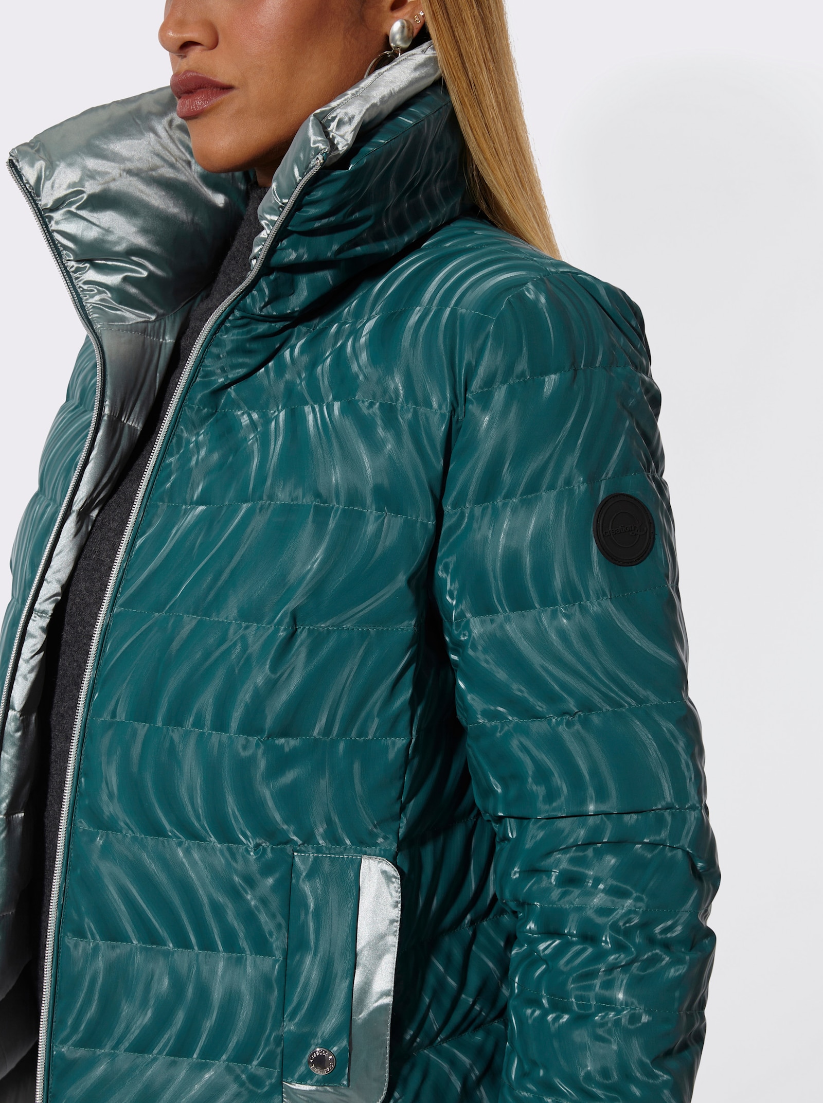 Daunenjacke zum Wenden - petrol