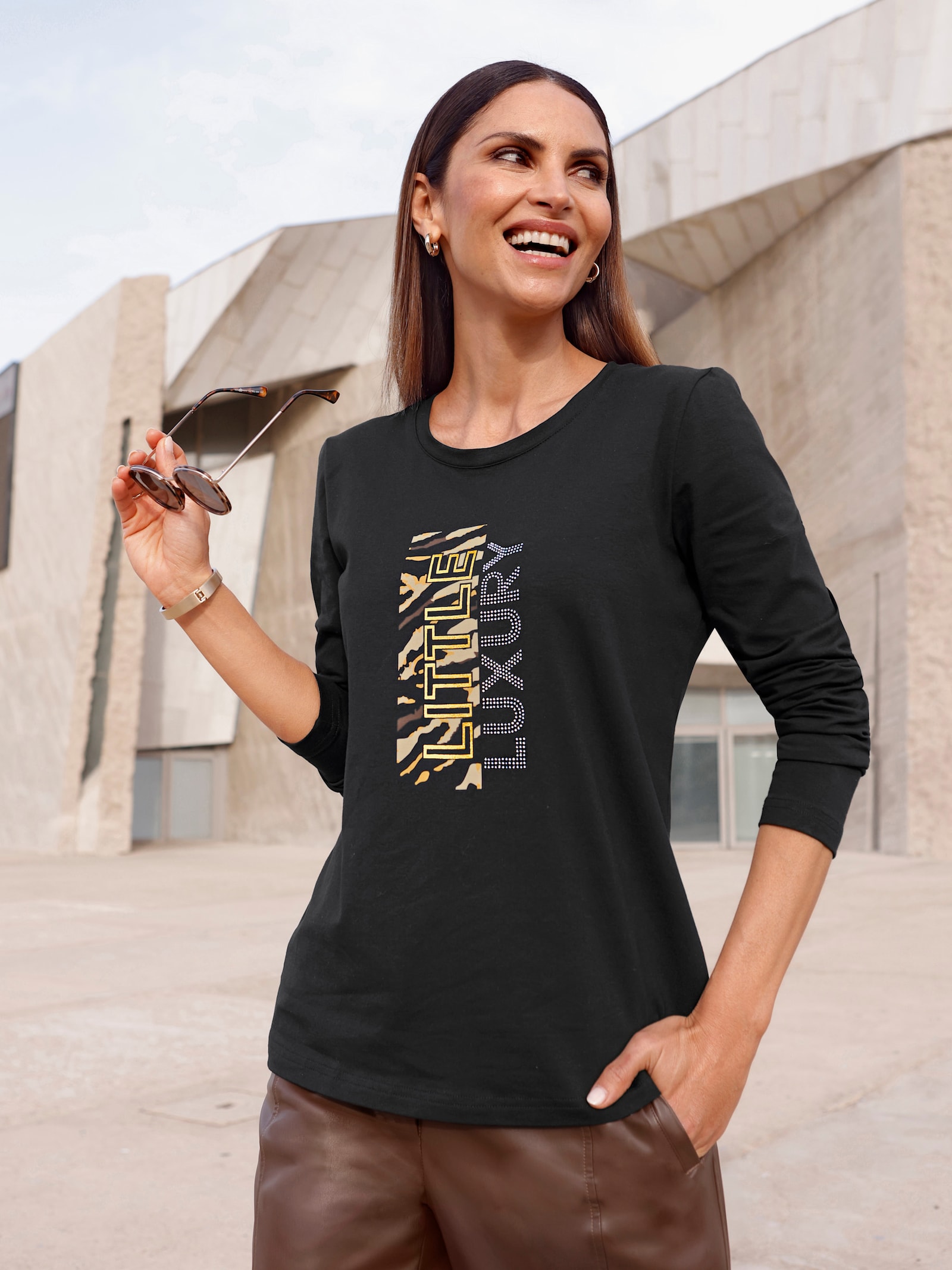 Langarmshirt mit Druck mit Glitzersteinchen - schwarz