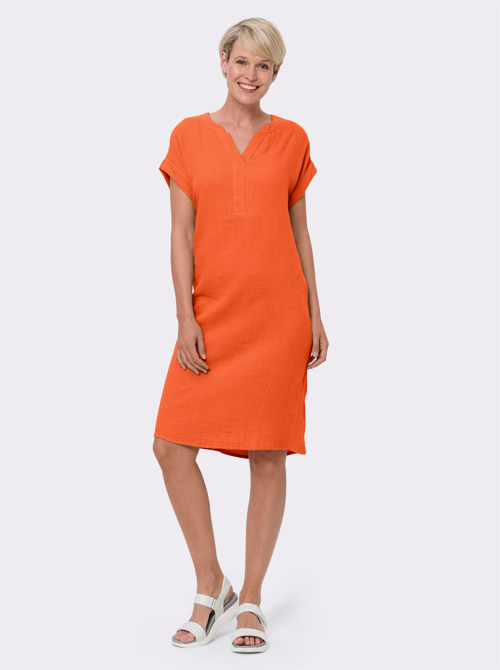 Bomullsklänning i muslinmaterial - orange