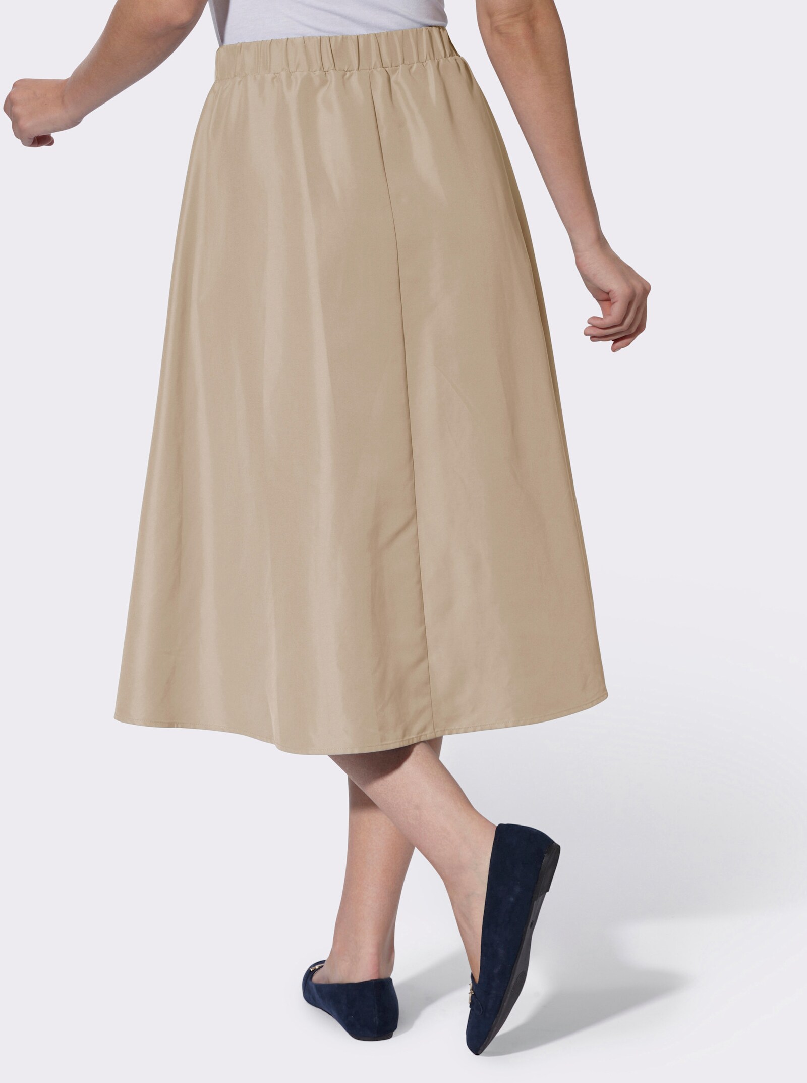 Kjol i utställd modell med fuskknappslå fram - beige