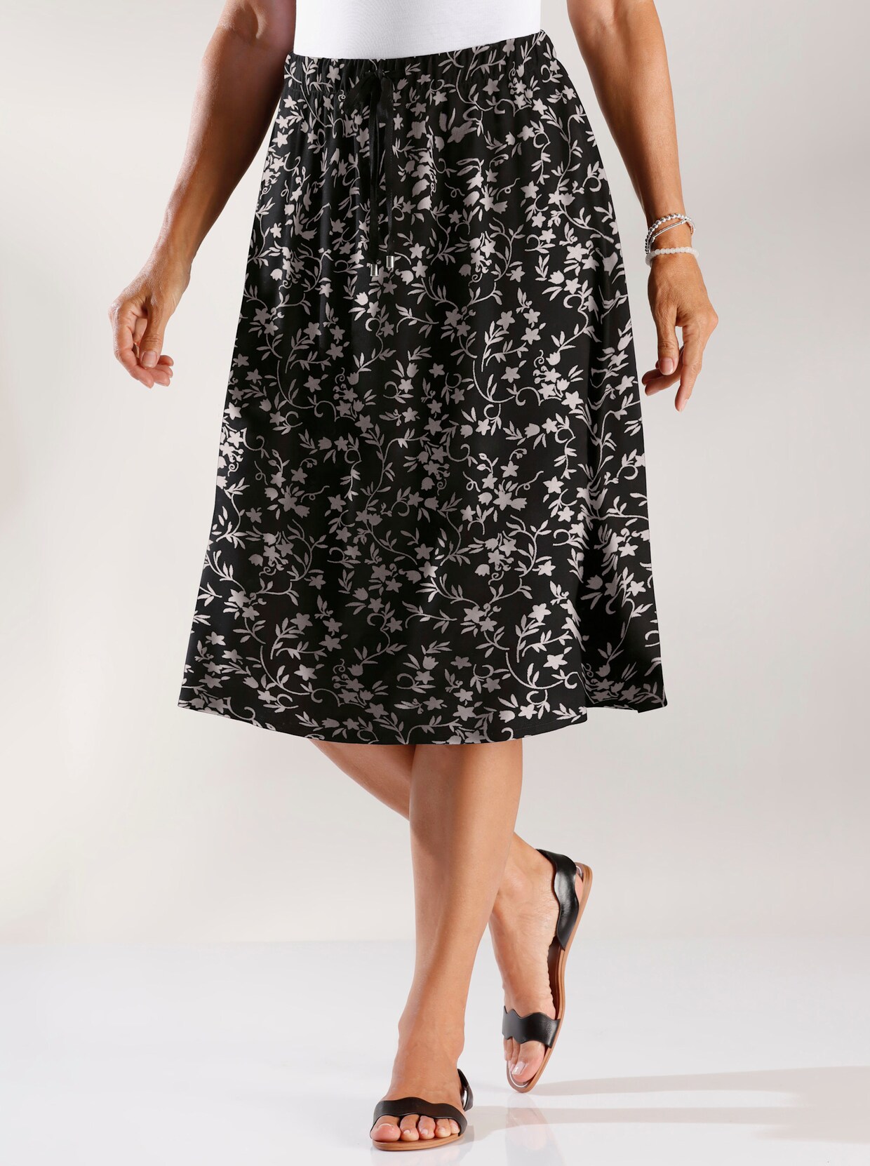 Tkaná sukně - černá-květinový vzor