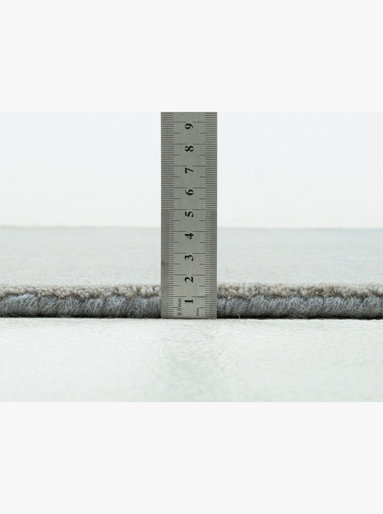 Theko Handwebteppich - grau
