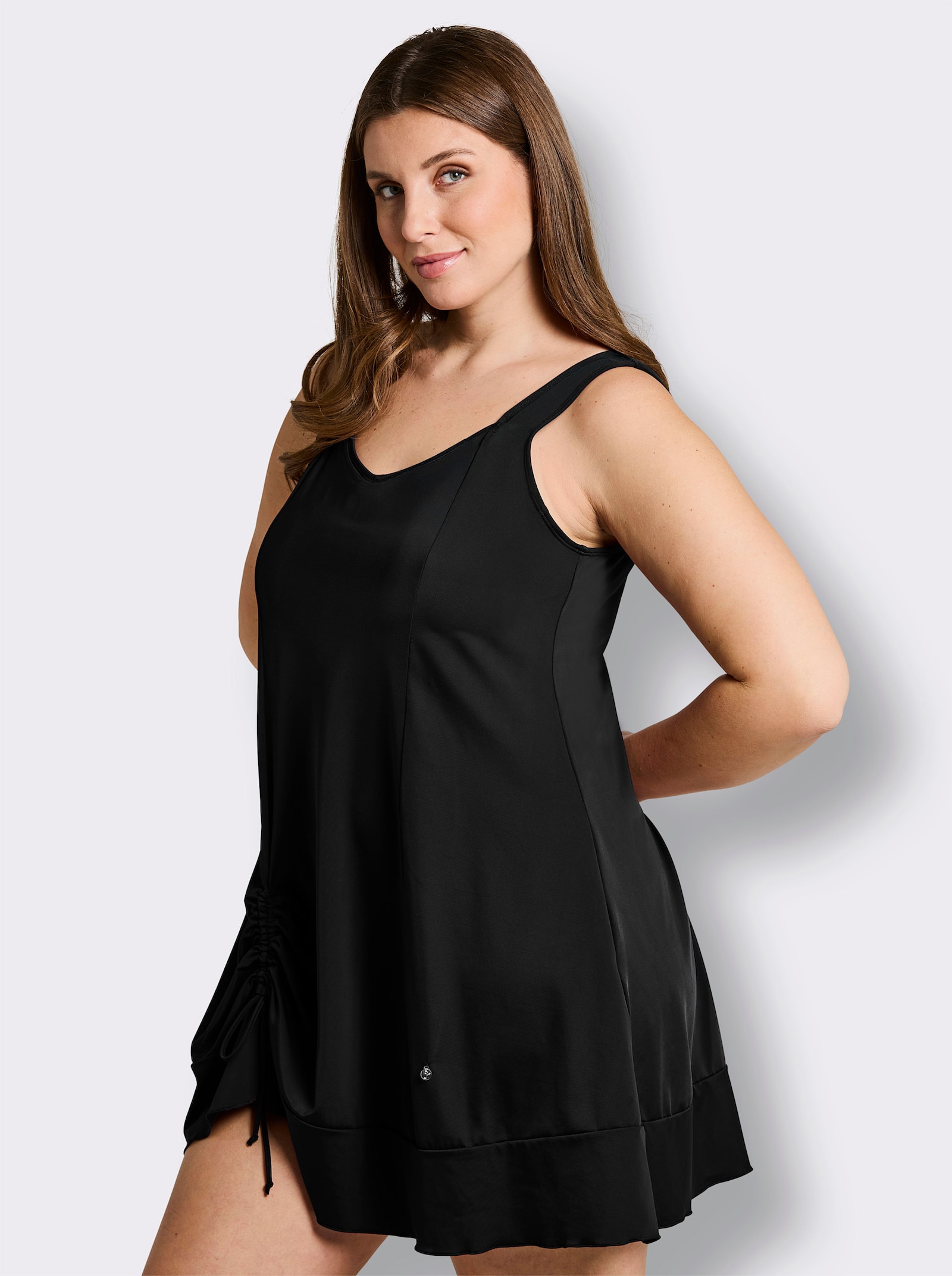 sheego Badekleid mit Raffung am Saum - schwarz