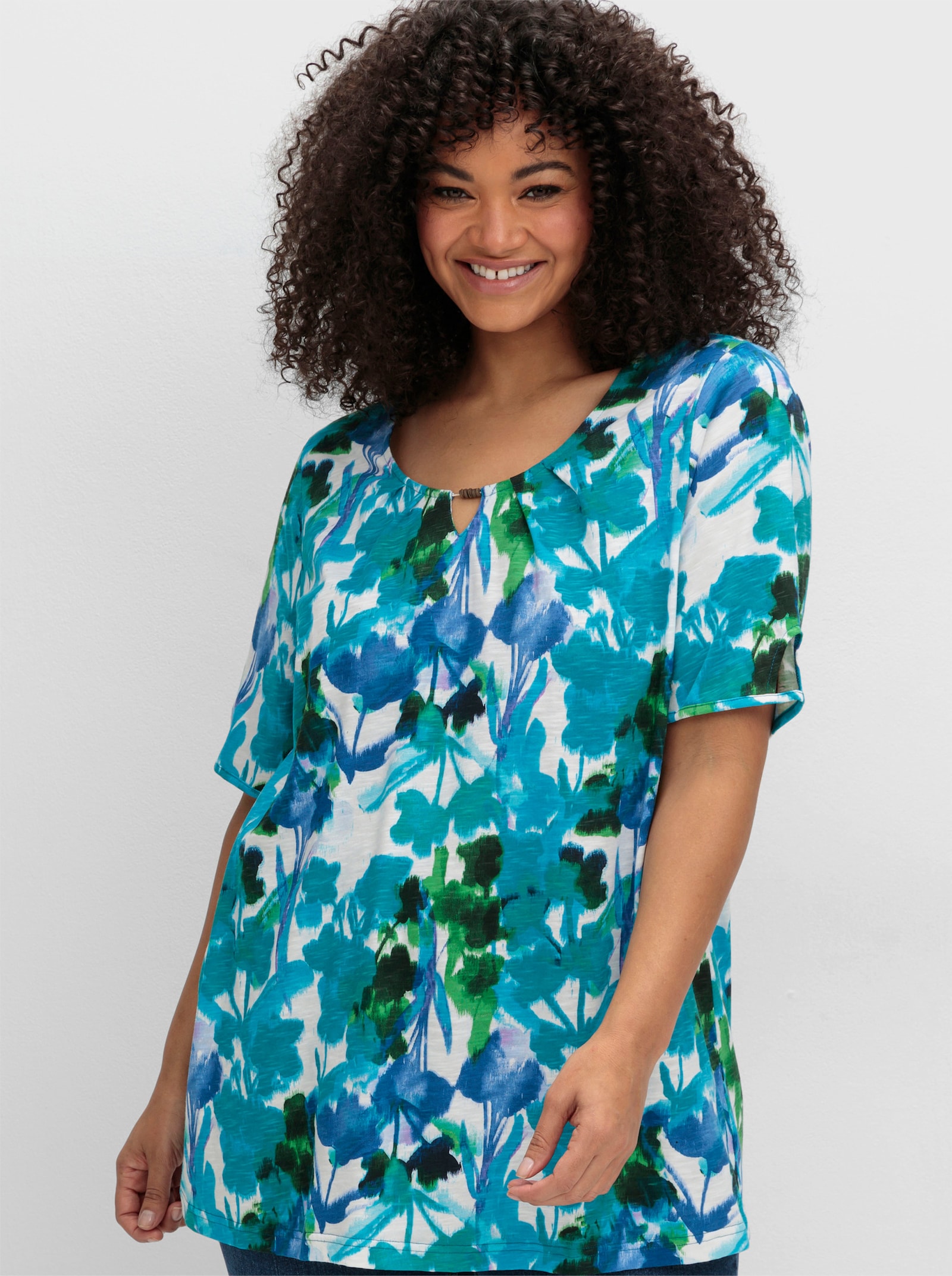 sheego Kurzarmshirt in A-Linie - türkis-gemustert